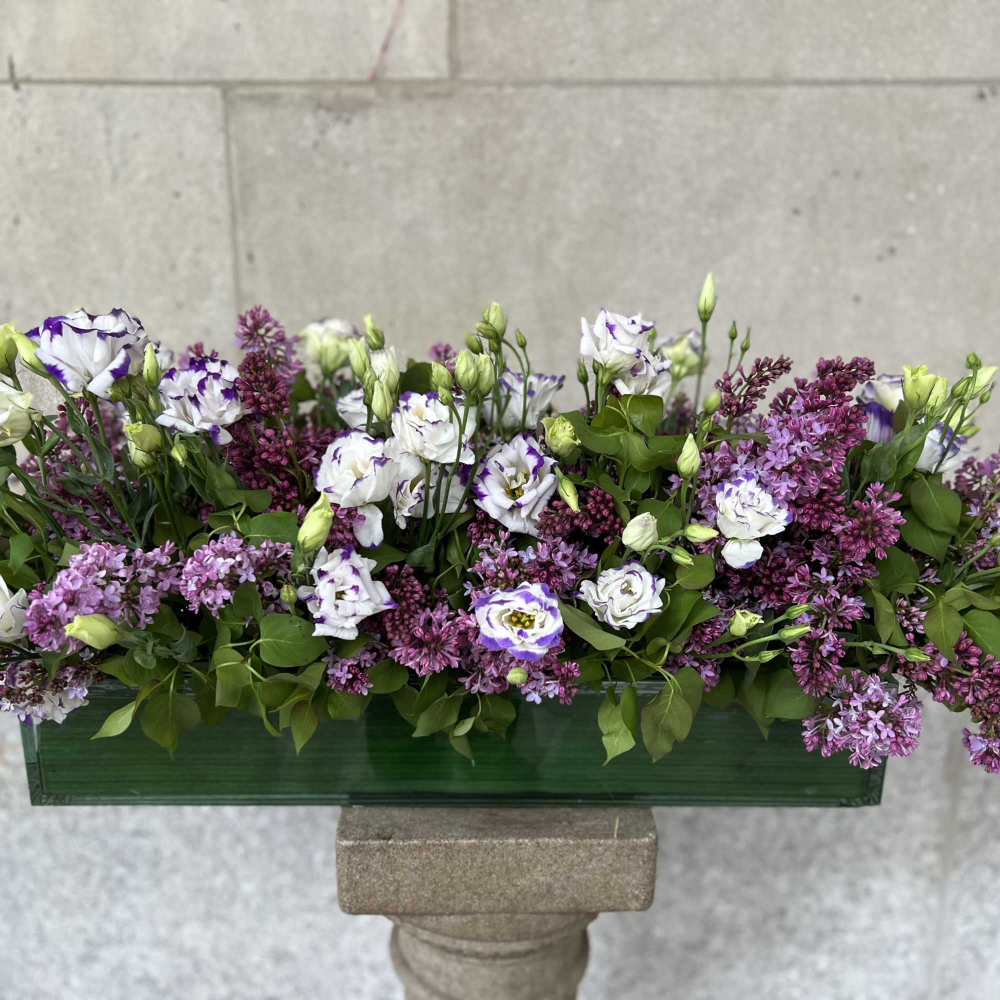 Flowers by Philip offers  the most large variety's of customs centerpieces, photo 8 of 8