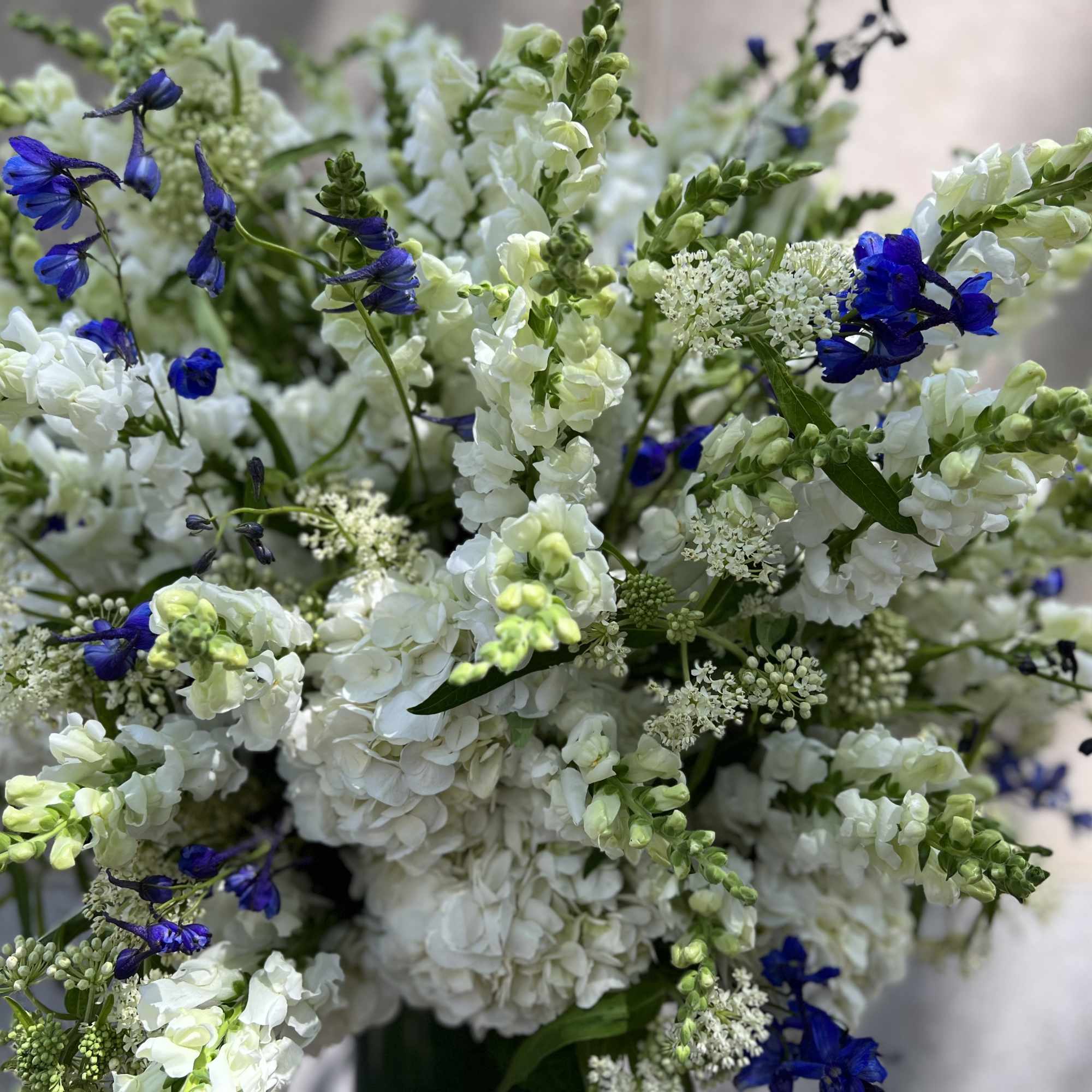 For the service: Features a lush assortment of primarily white color flowers, photo 4 of 7