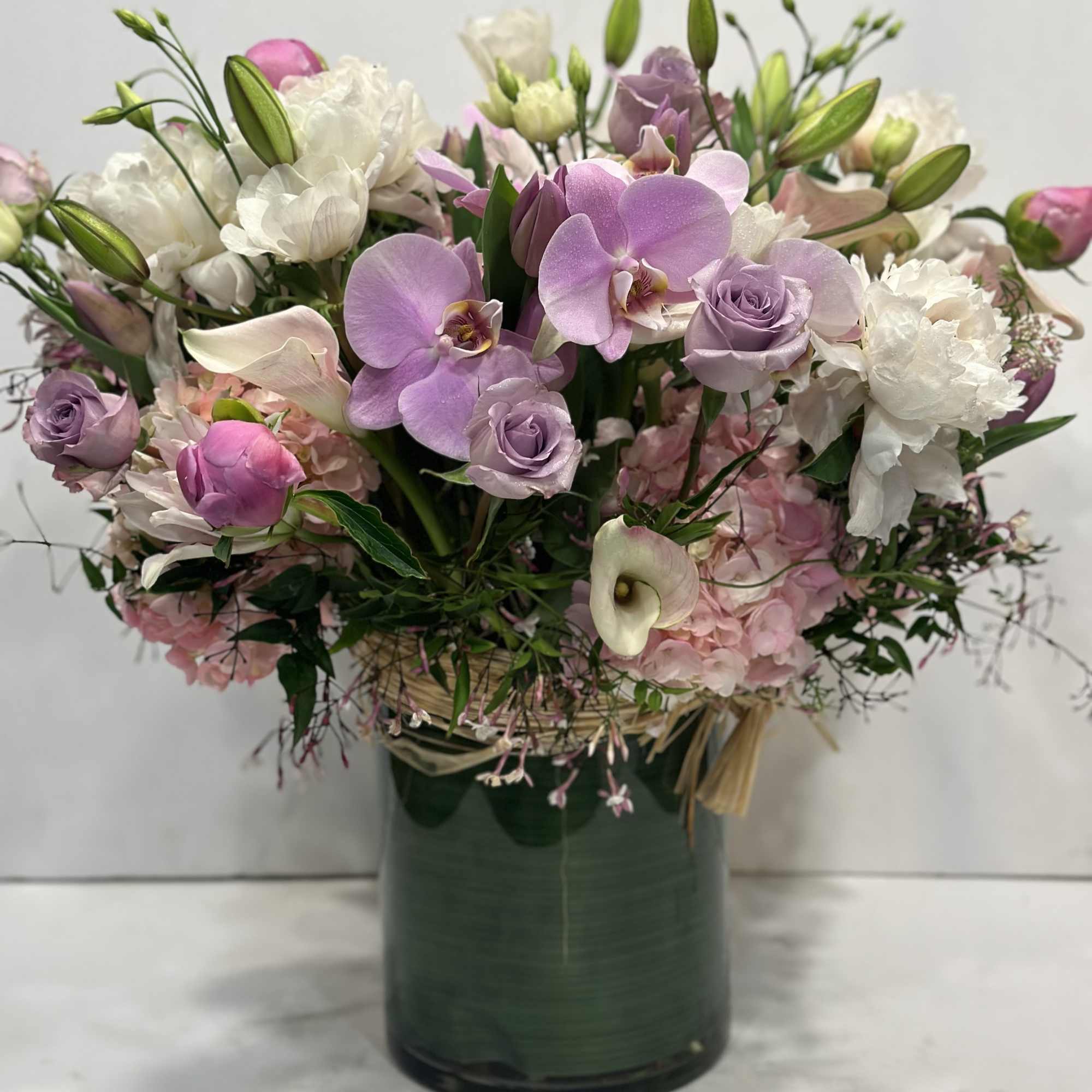 Medium high floral arrangement compose of an assortment of Jules Elie peonies, photo 3 of 7