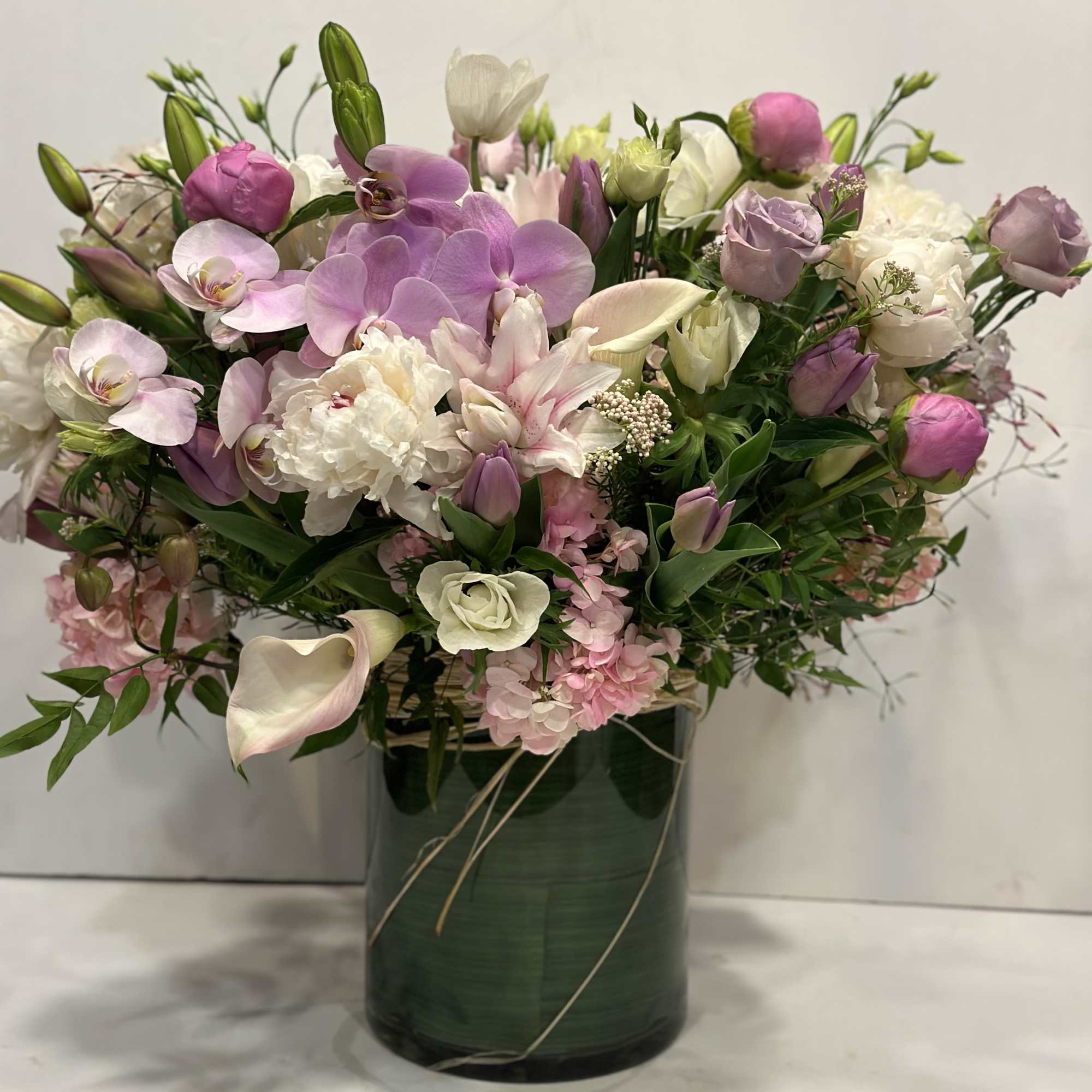 Medium high floral arrangement compose of an assortment of Jules Elie peonies, photo 4 of 7