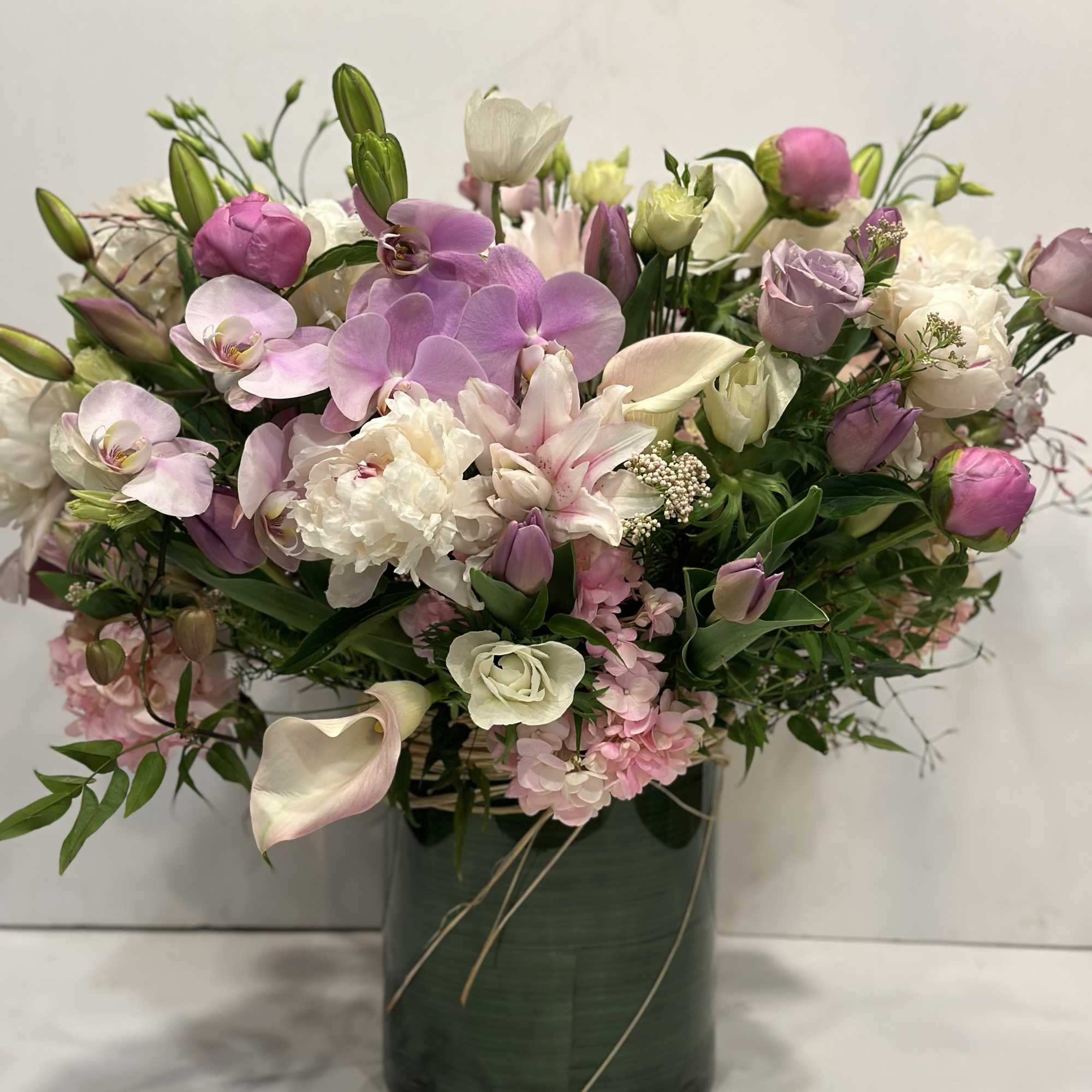 Medium high floral arrangement compose of an assortment of Jules Elie peonies, photo 6 of 7