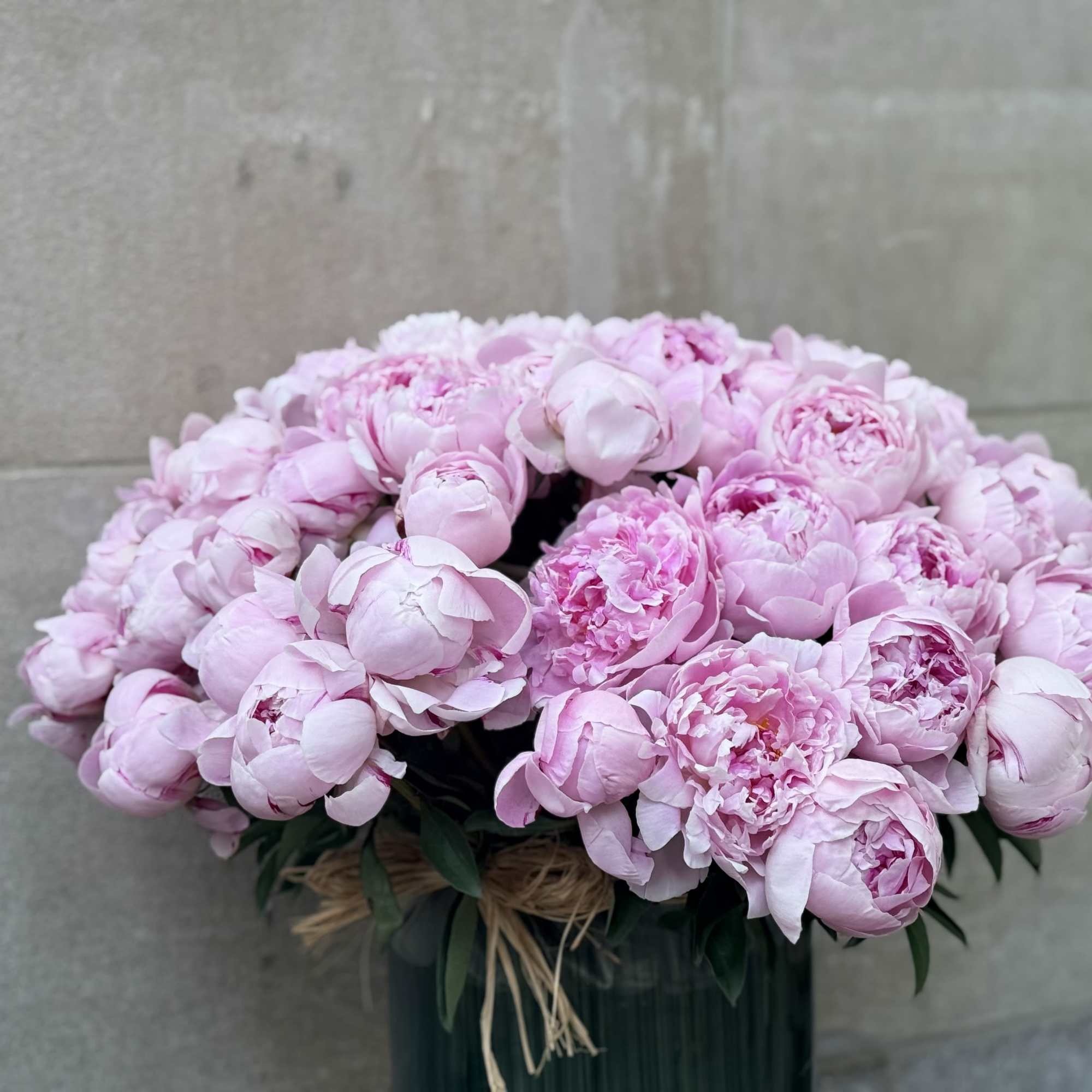 A cloudlike dome of pale pink peonies creates an instantly romantic statement, photo 4 of 5