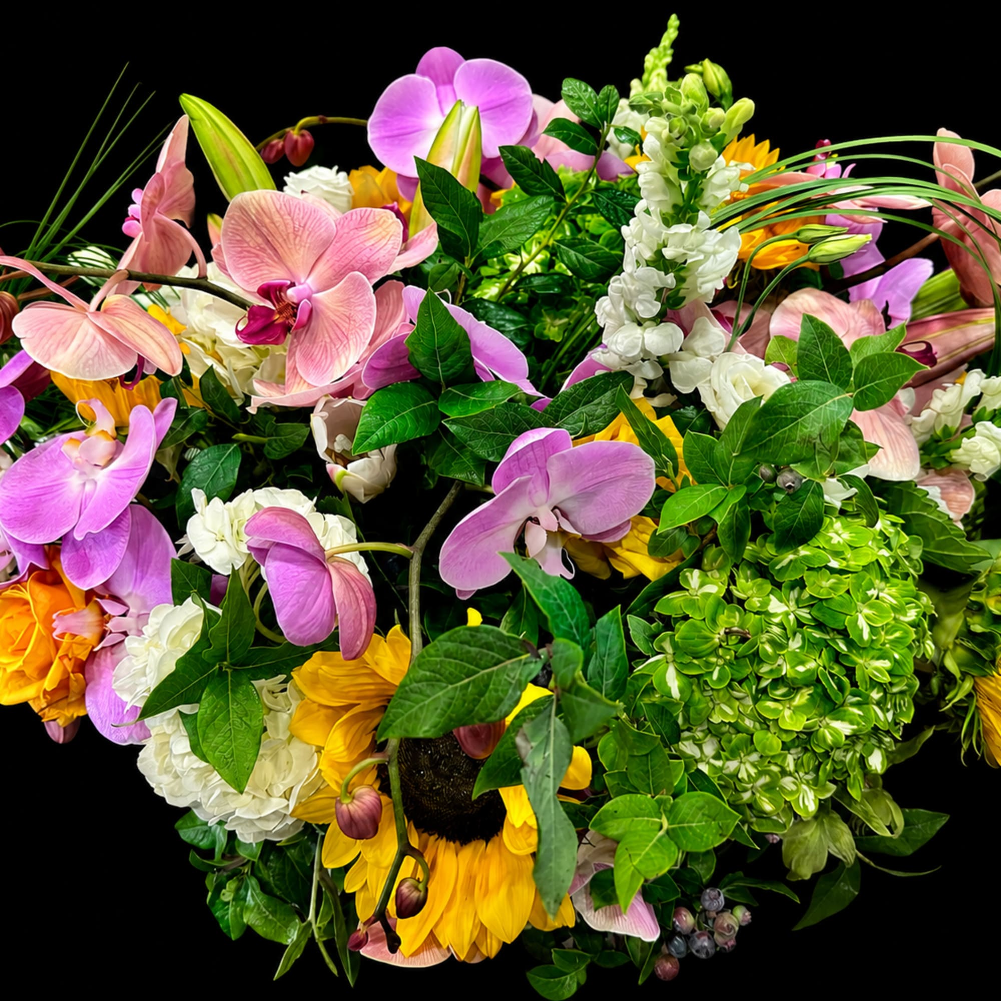 Features:

Premium fresh-cut flowers
Handcrafted by professional floral designers
Modern green ceramic keepsake vase included
Approximately, photo 2 of 3