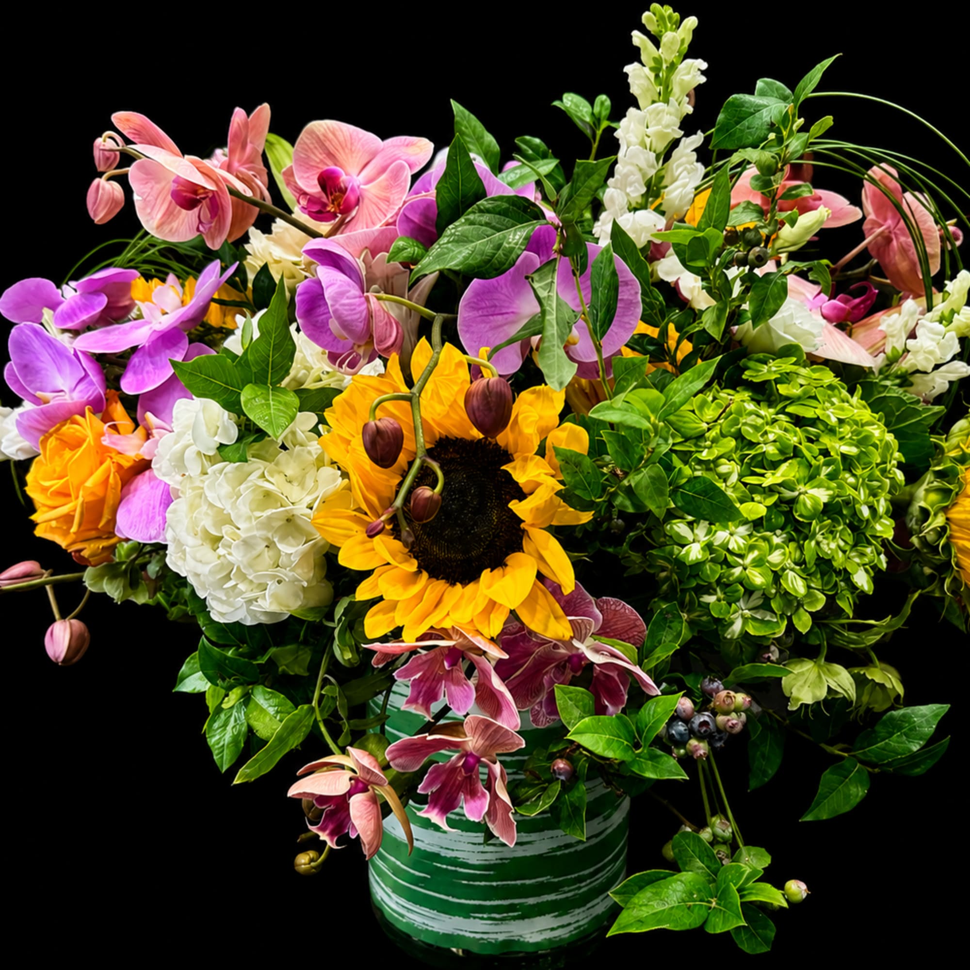 Features:

Premium fresh-cut flowers
Handcrafted by professional floral designers
Modern green ceramic keepsake vase included
Approximately, photo 3 of 3