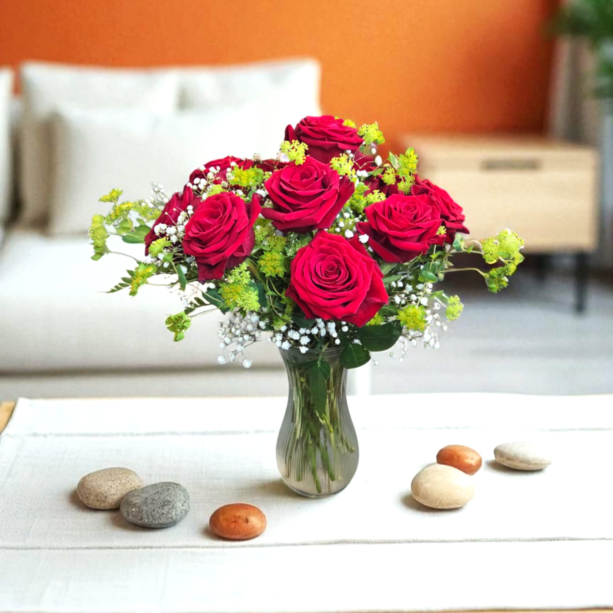 Bouquet of red roses in a clear glass vase