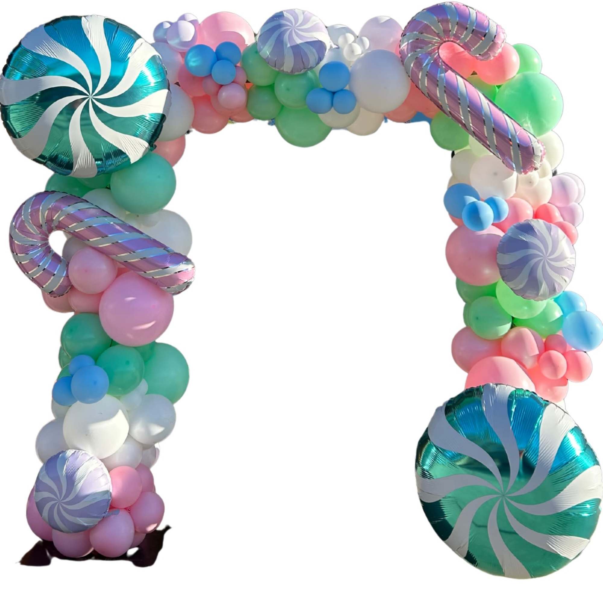 Pastel balloon arch with large peppermint swirl foil balloons