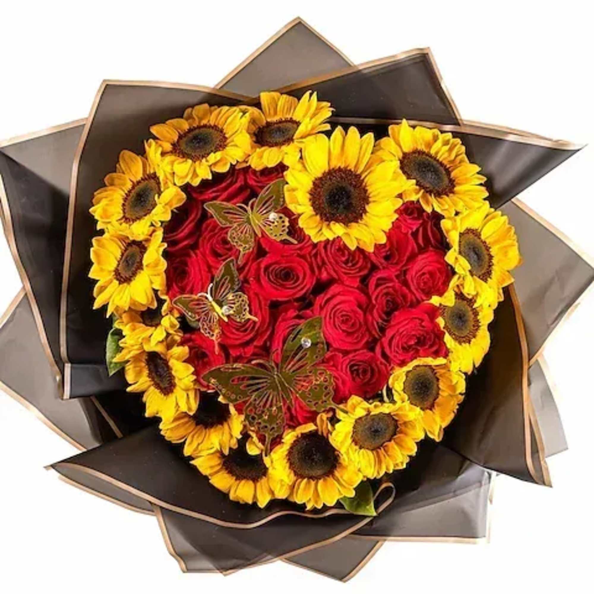 Heart-shaped bouquet of red roses and yellow sunflowers wrapped in dark paper