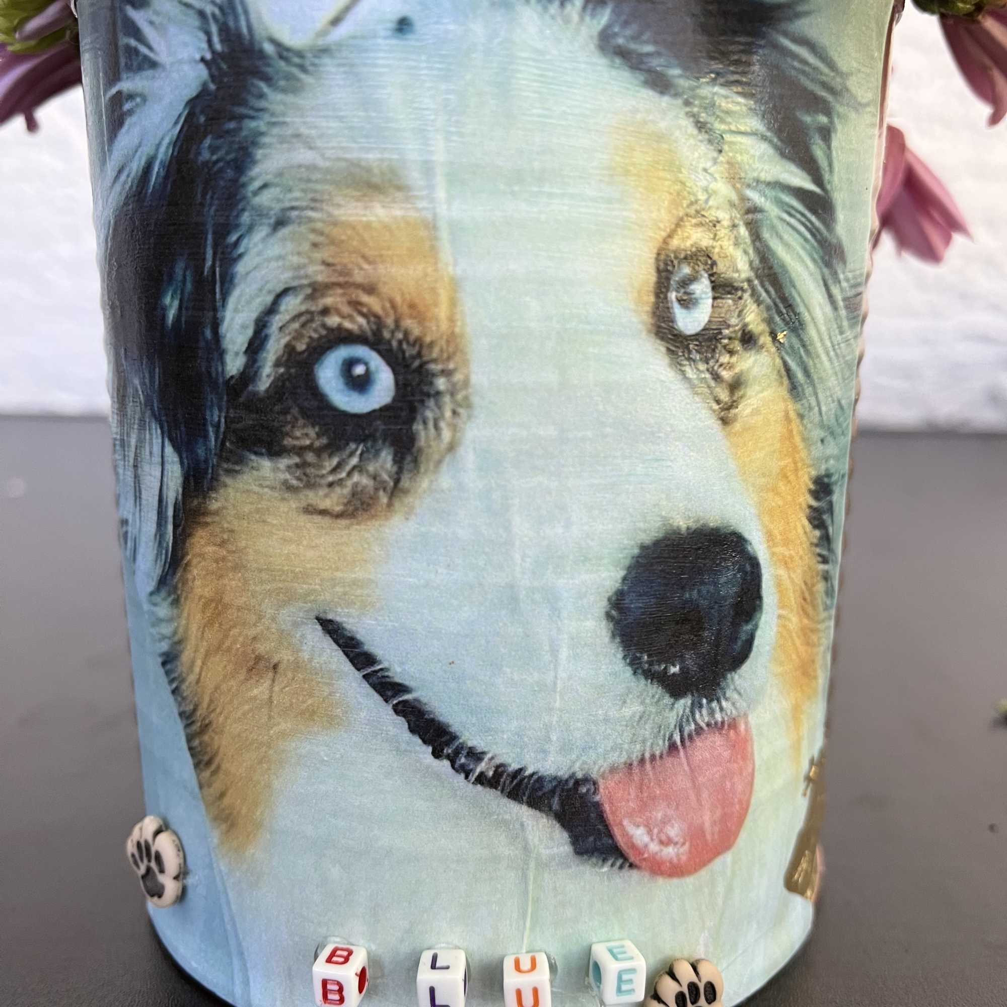 Flower bucket with a large dog face print and blue letter beads