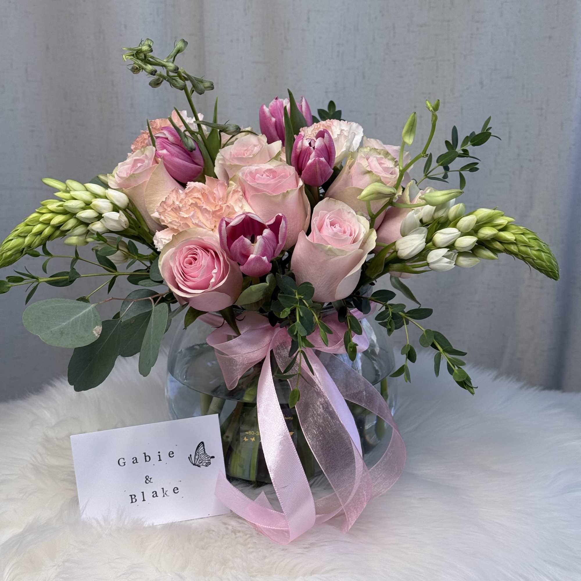 A delicate floral arrangement that blends the elegance of fresh blooms with