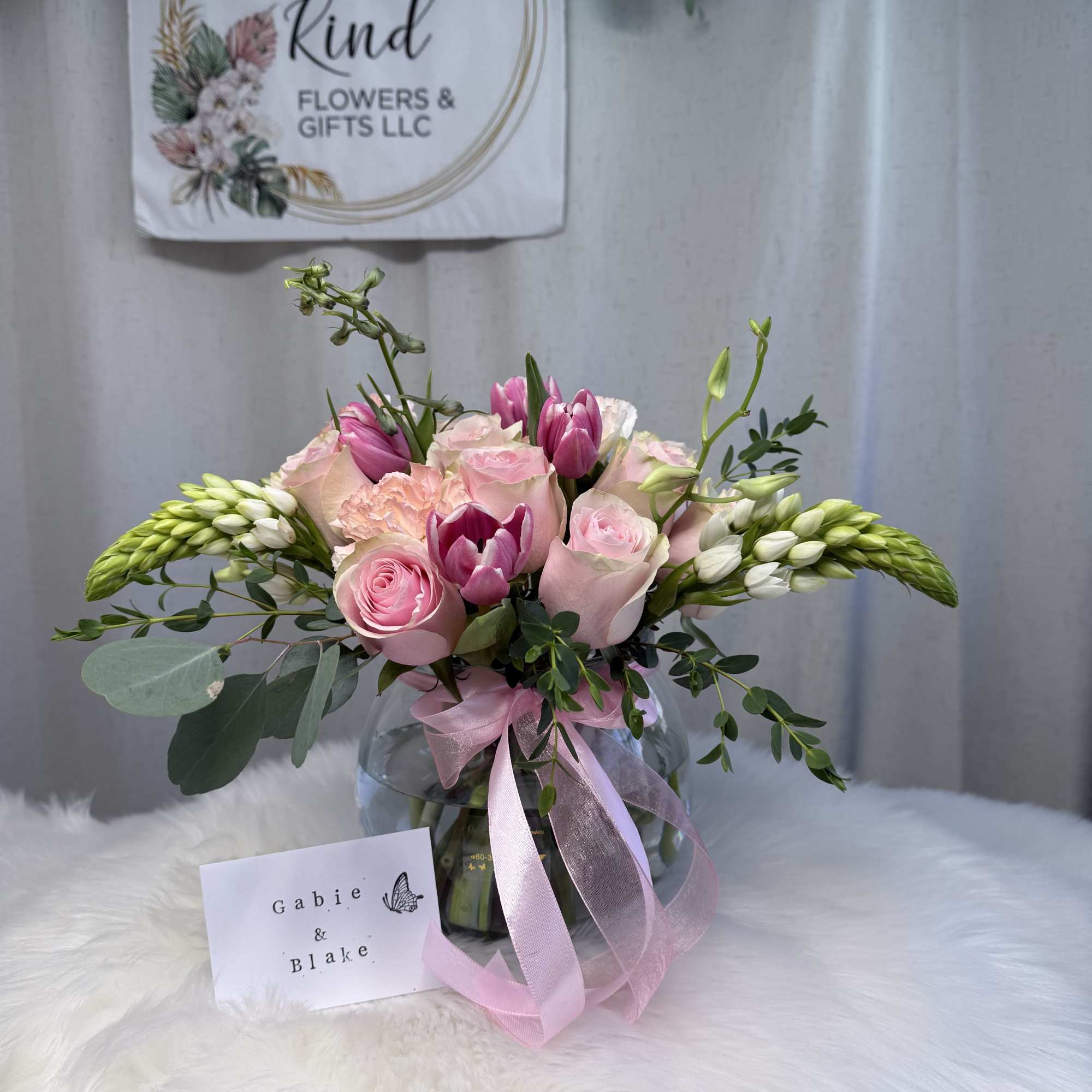 A delicate floral arrangement that blends the elegance of fresh blooms with, photo 2 of 2