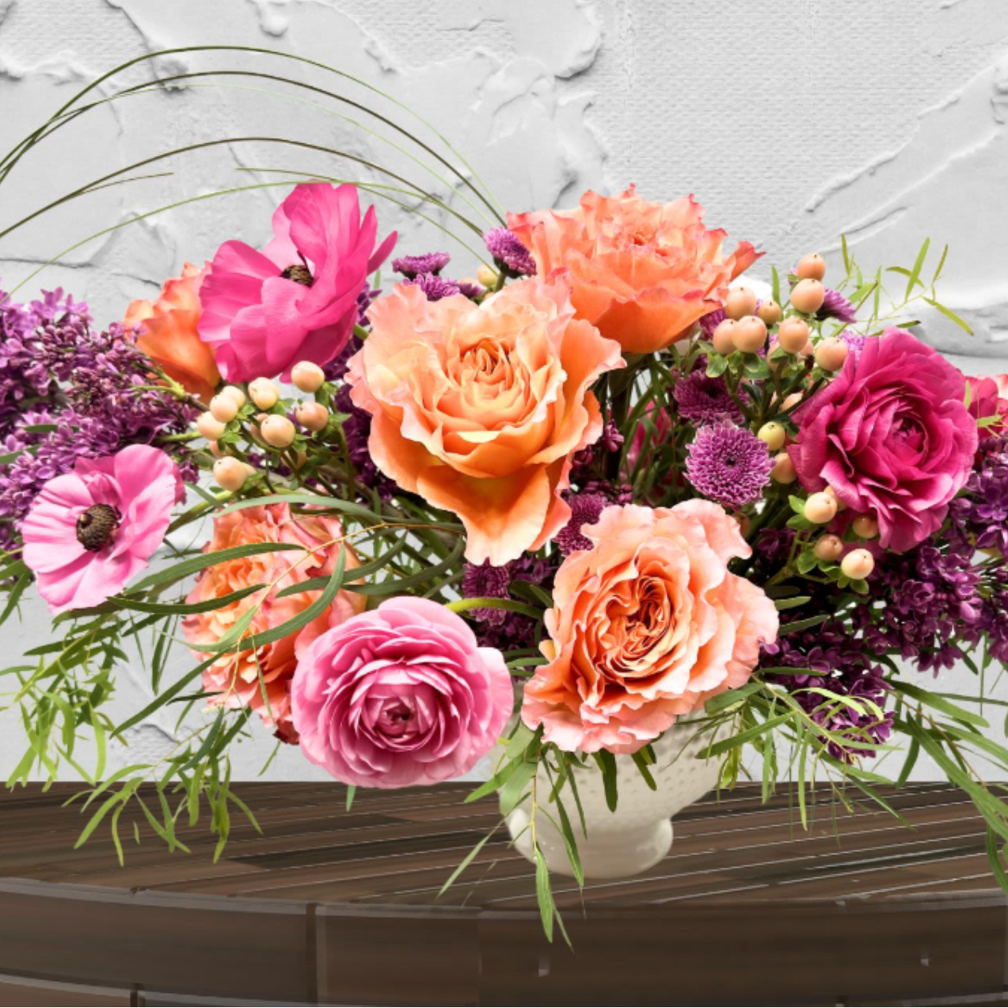 "Hand-crafted by accredited Master Florist Tricia Won (AIFD, EMC, IMF) No two