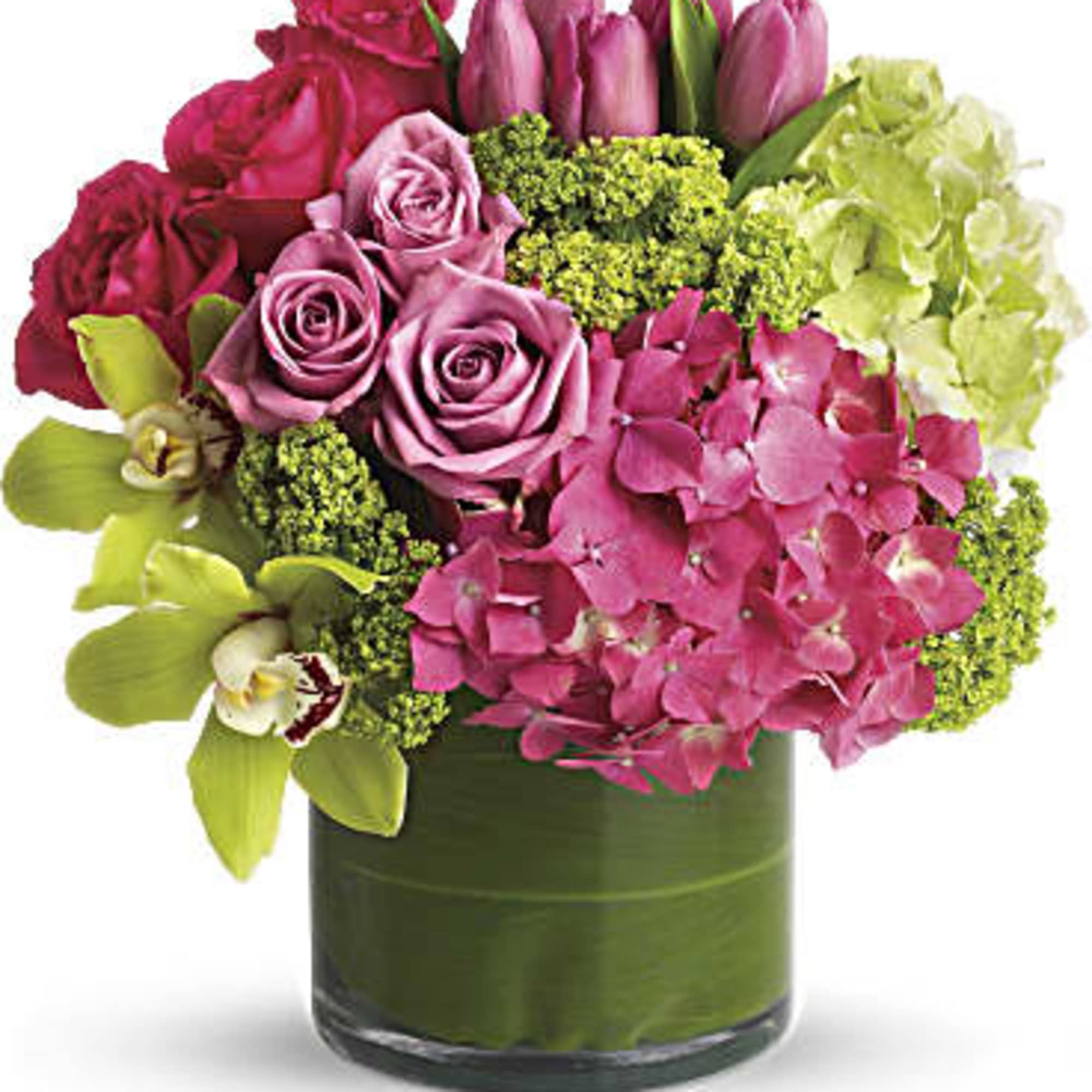 Pink roses and tulips with hydrangea in a green glass vase