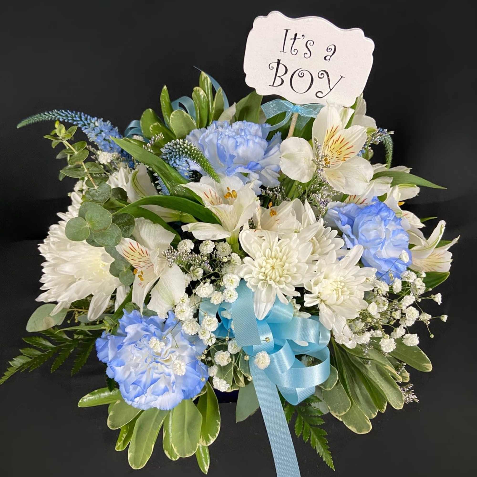 Welcome a new bright-eyed baby boy into the world with this blue