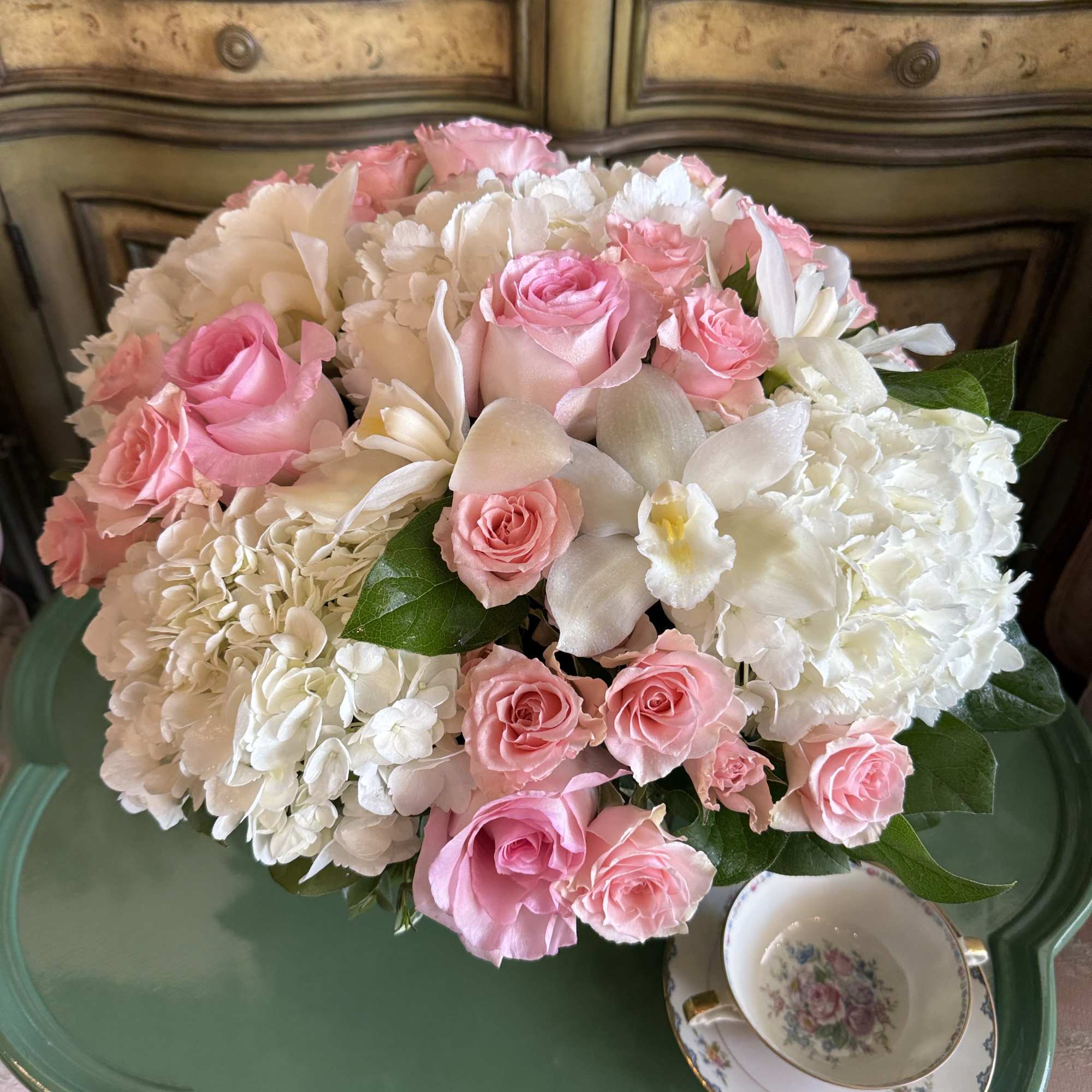 Beauty in simplicity. This elegant arrangement features a white palette with soft, photo 2 of 3