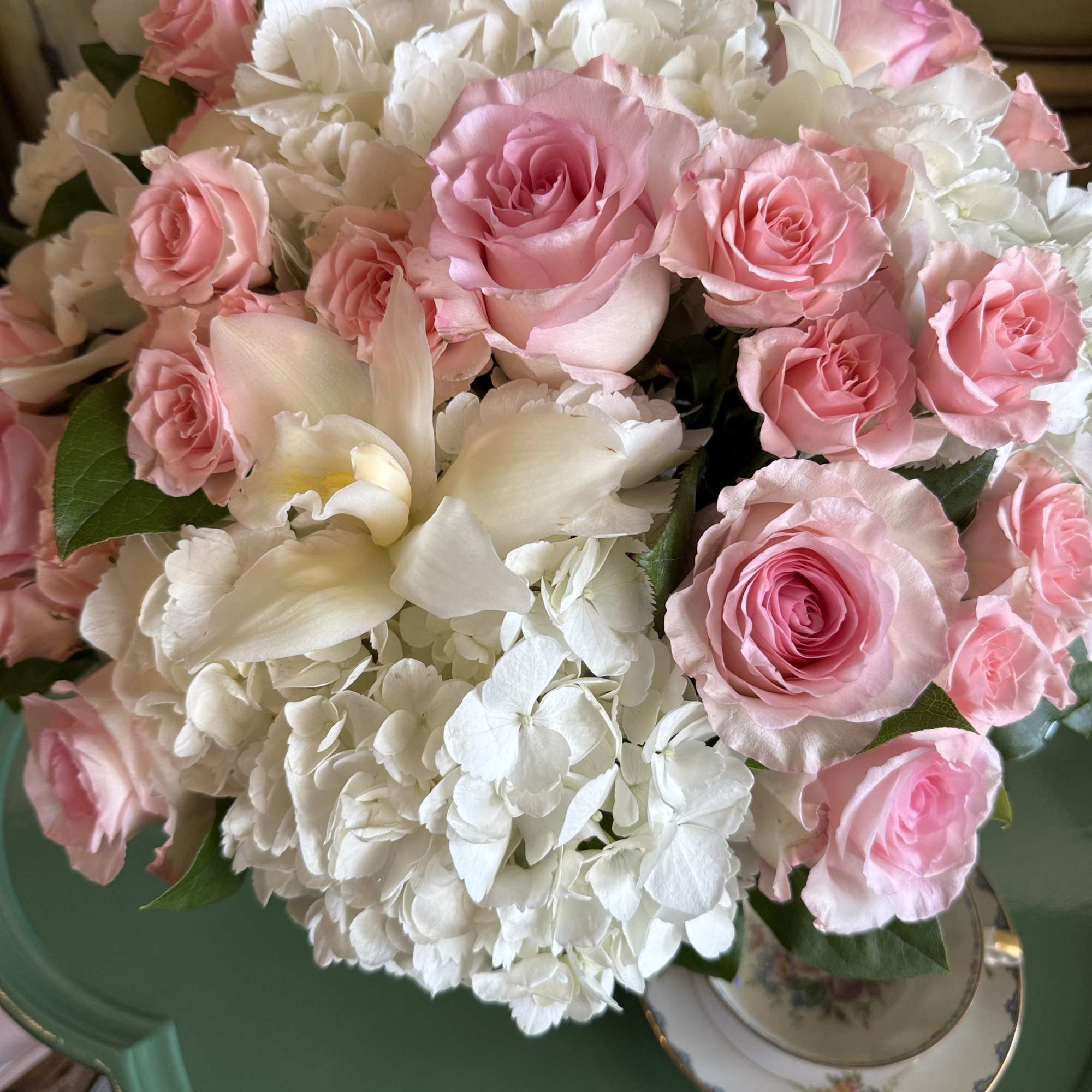 Beauty in simplicity. This elegant arrangement features a white palette with soft, photo 3 of 3