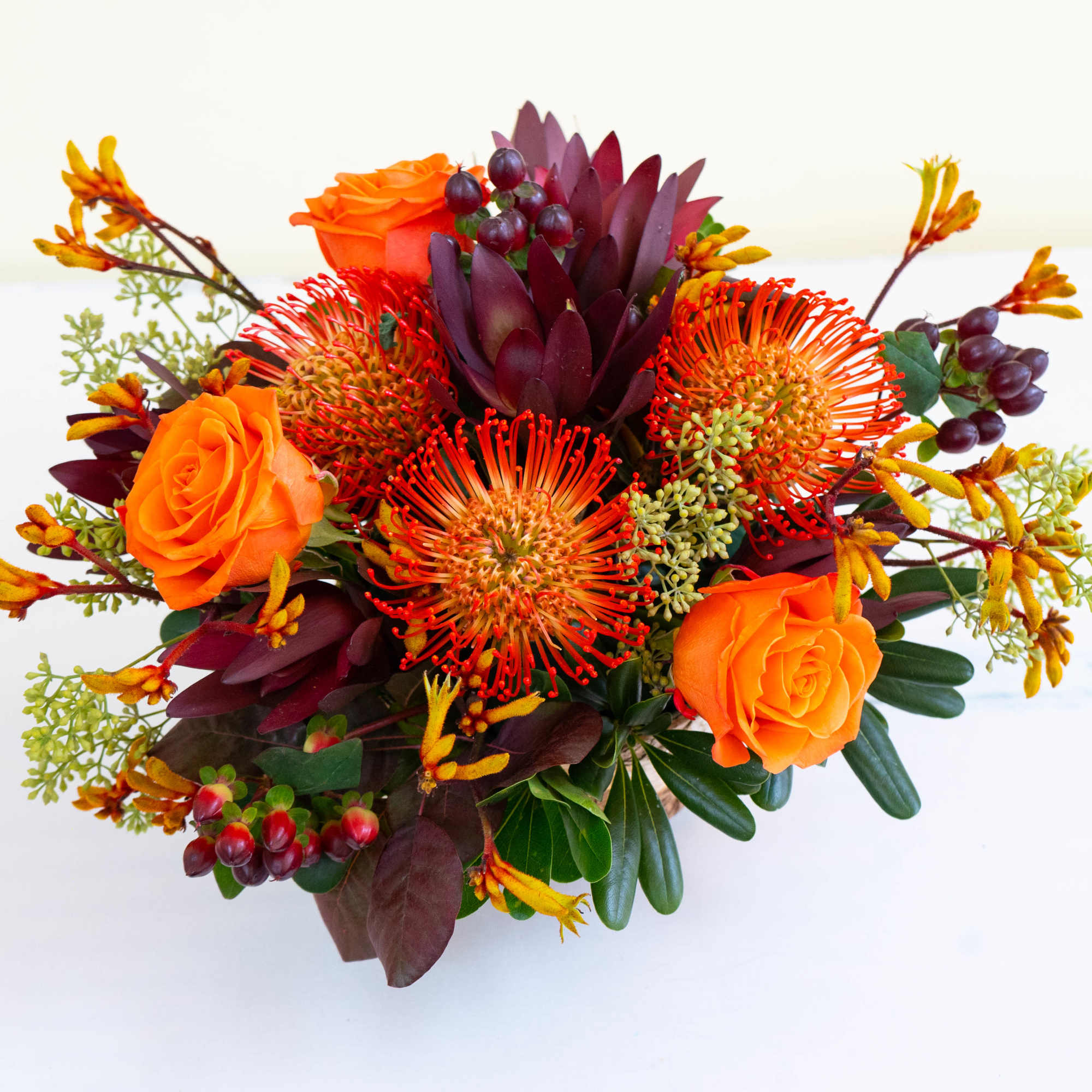 Gorgeous harvest-themed arrangement in a round, birch container featuring beautiful orange hues, photo 2 of 4