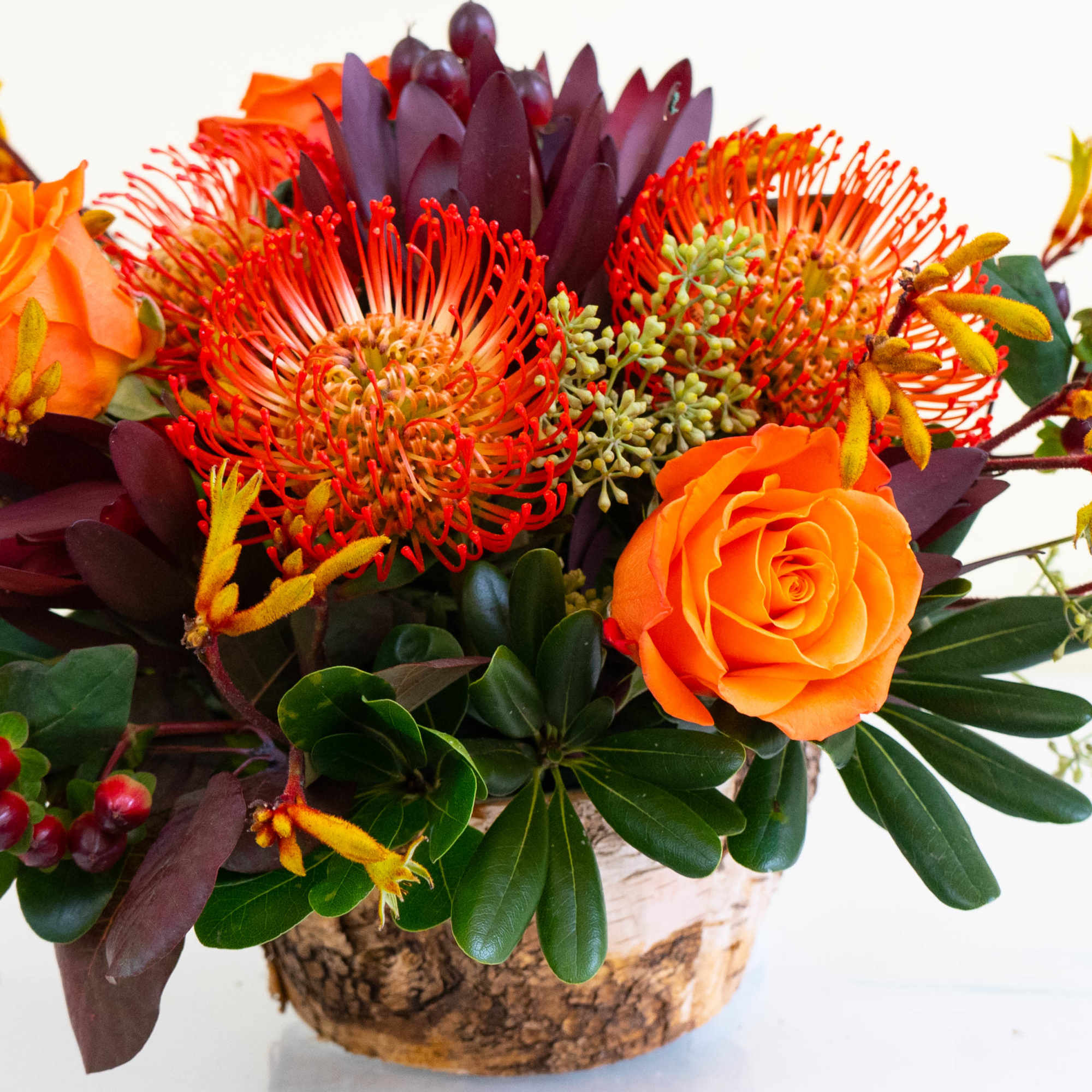 Gorgeous harvest-themed arrangement in a round, birch container featuring beautiful orange hues, photo 3 of 4
