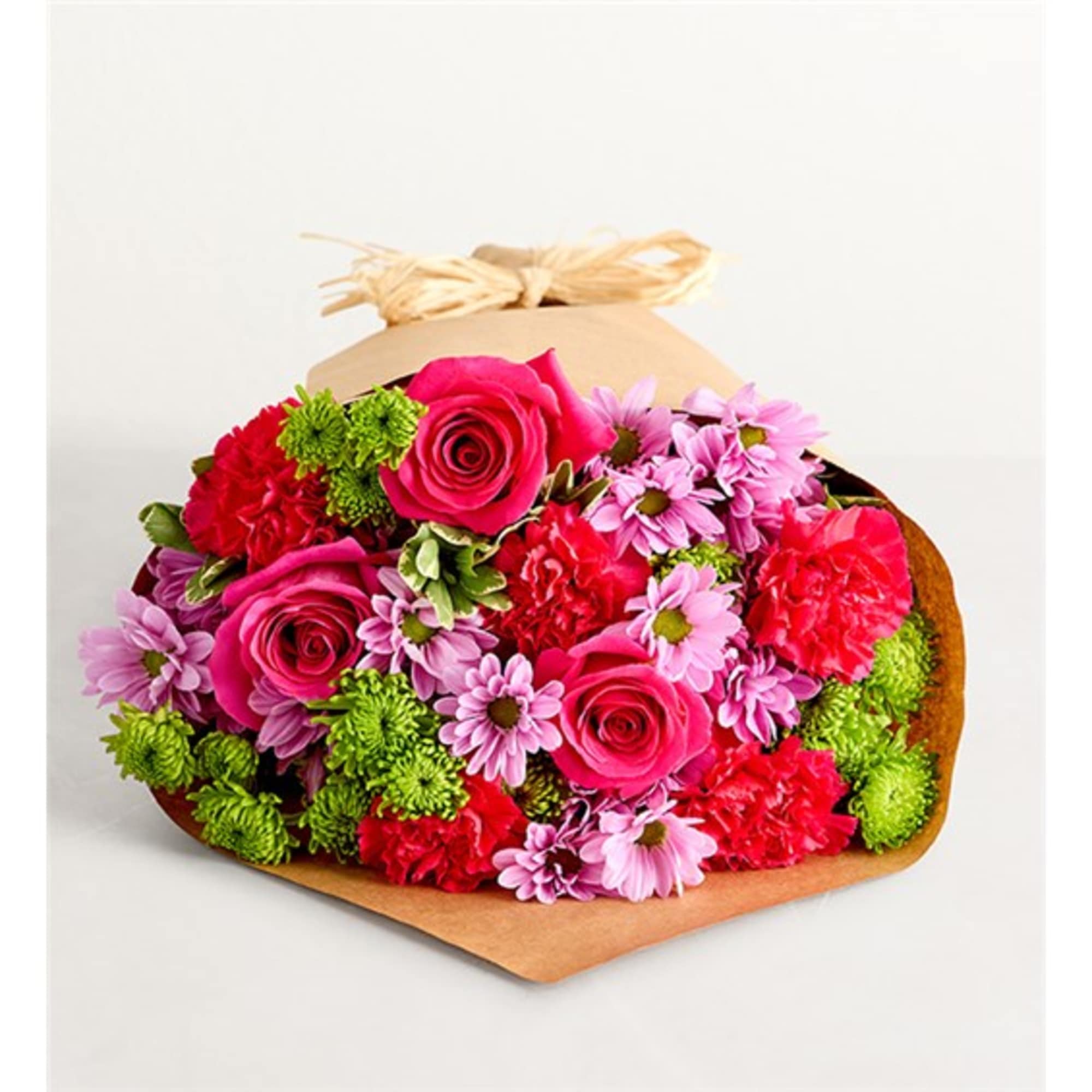 Bouquet of pink roses, carnations, and daisies wrapped in brown paper