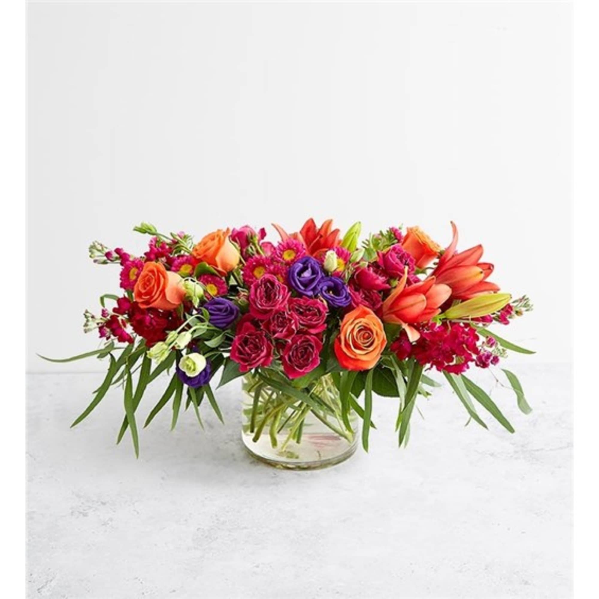 Colorful mixed bouquet in a clear glass vase