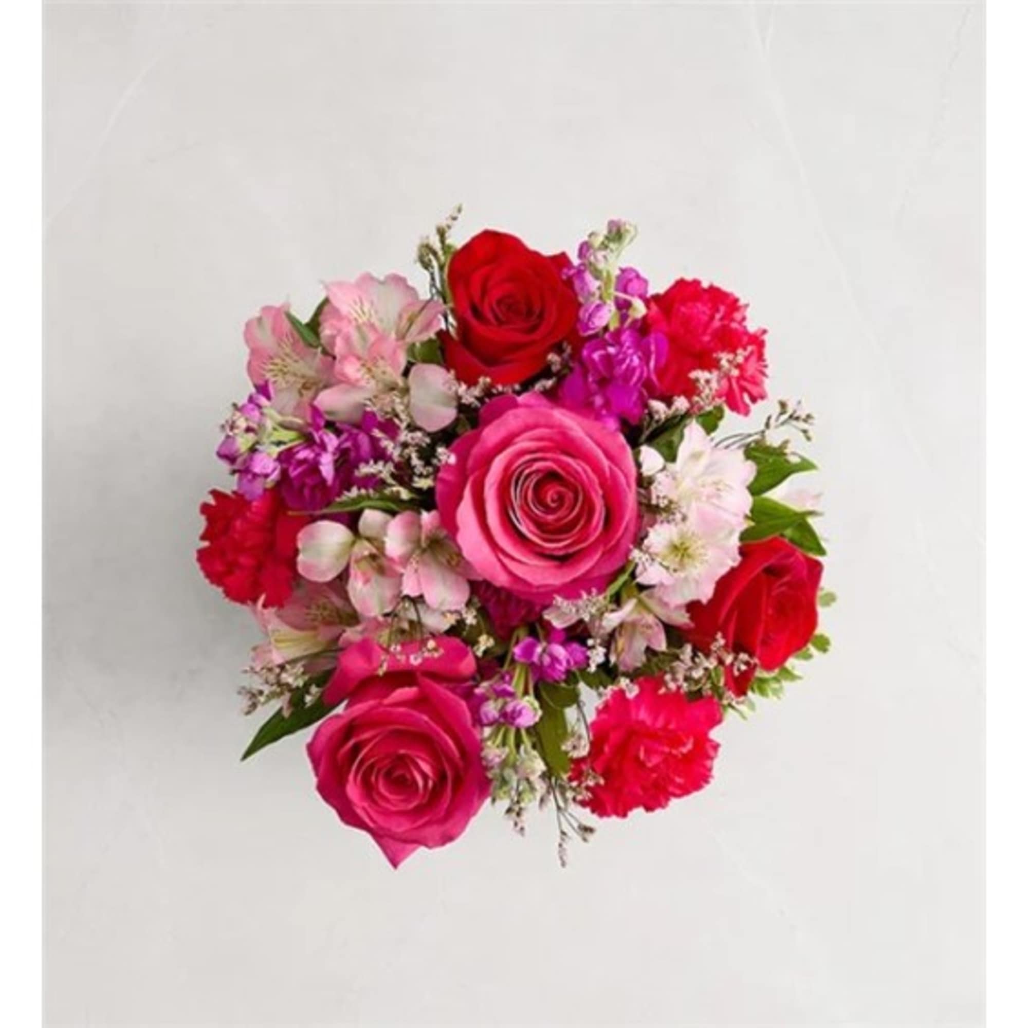 Bouquet of pink and red roses with small mixed flowers