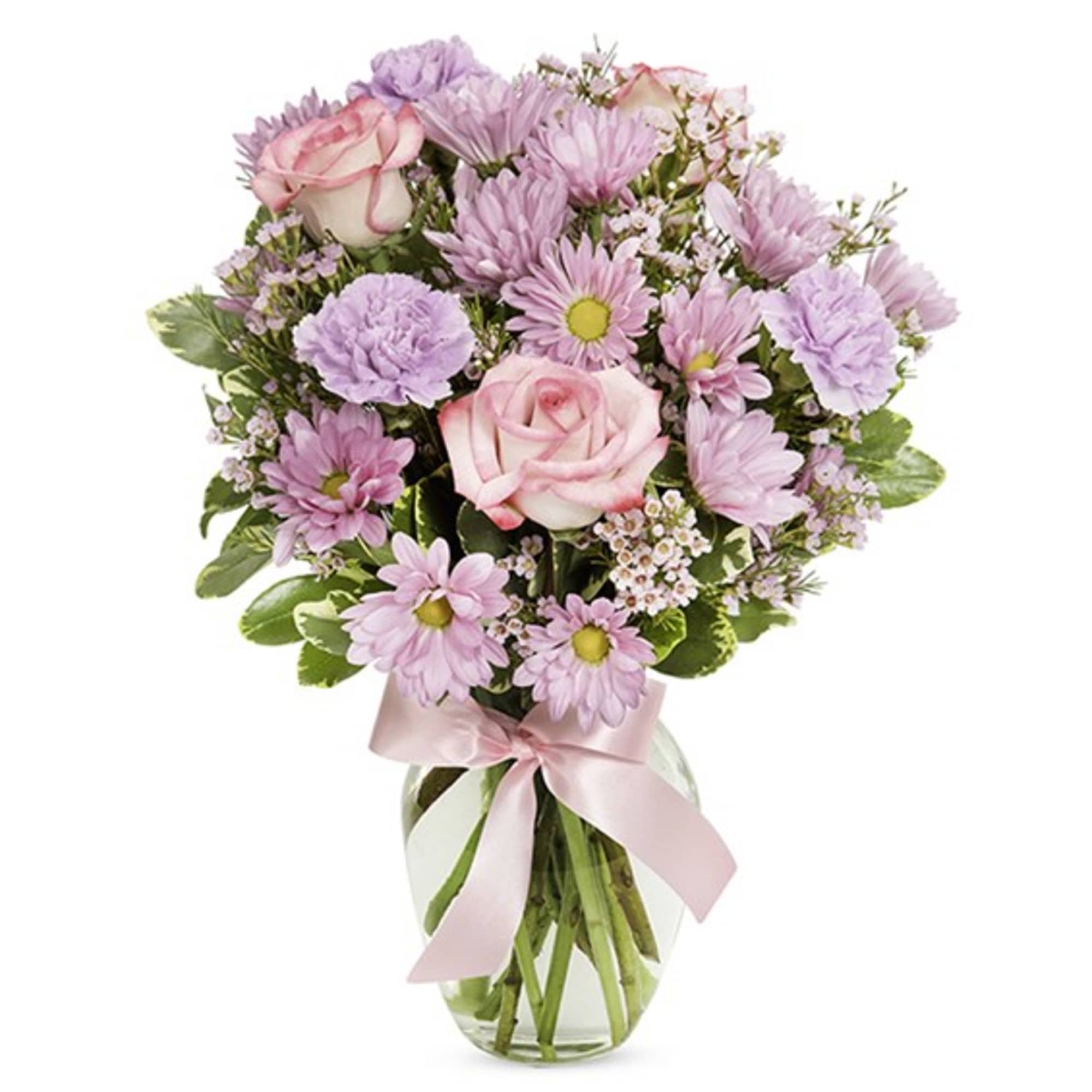 Pink roses and daisies in a clear glass vase with a pink ribbon