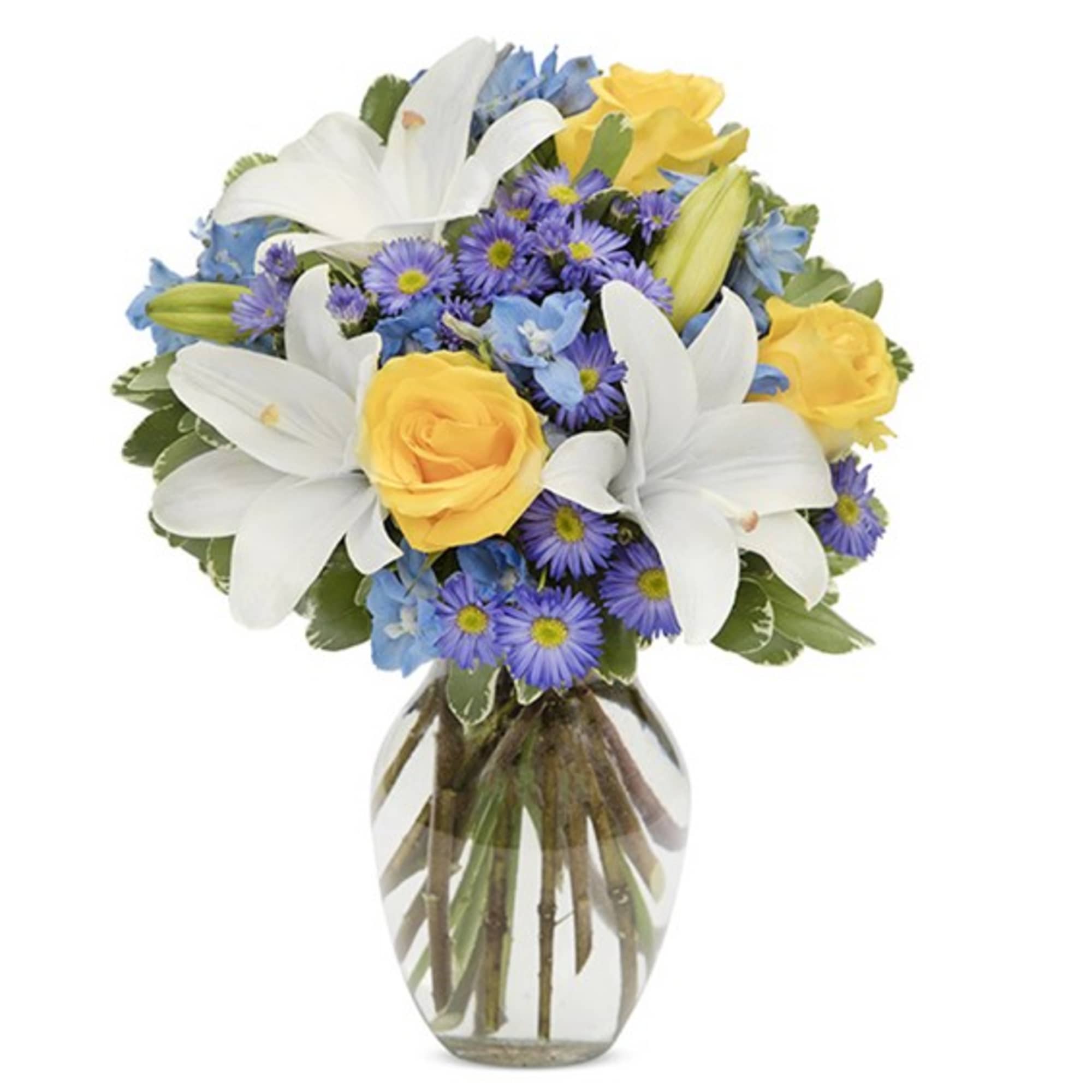 Bouquet of white lilies, yellow roses, and purple daisies in a glass vase