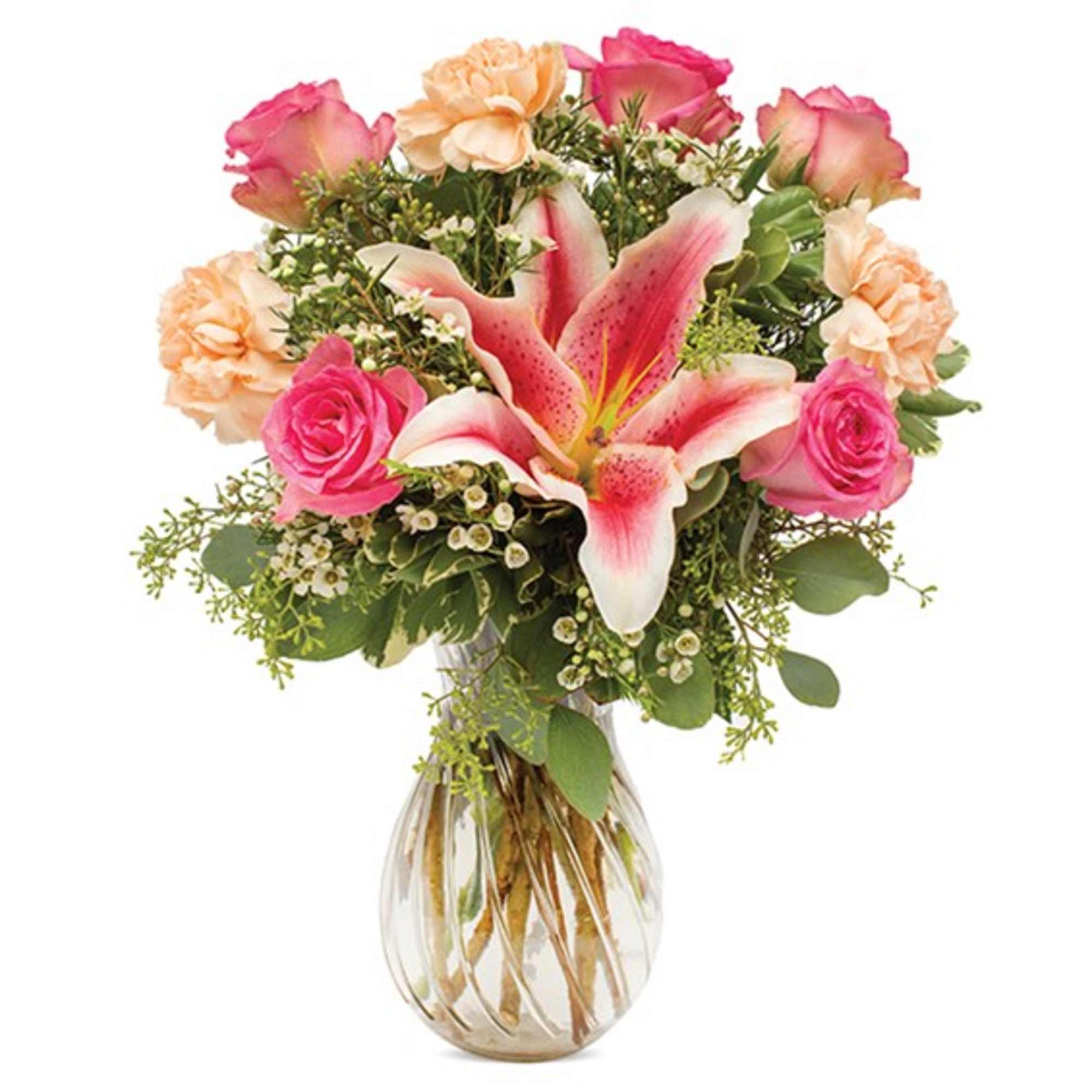 Bouquet of pink roses, peach carnations, and a pink lily in a glass vase