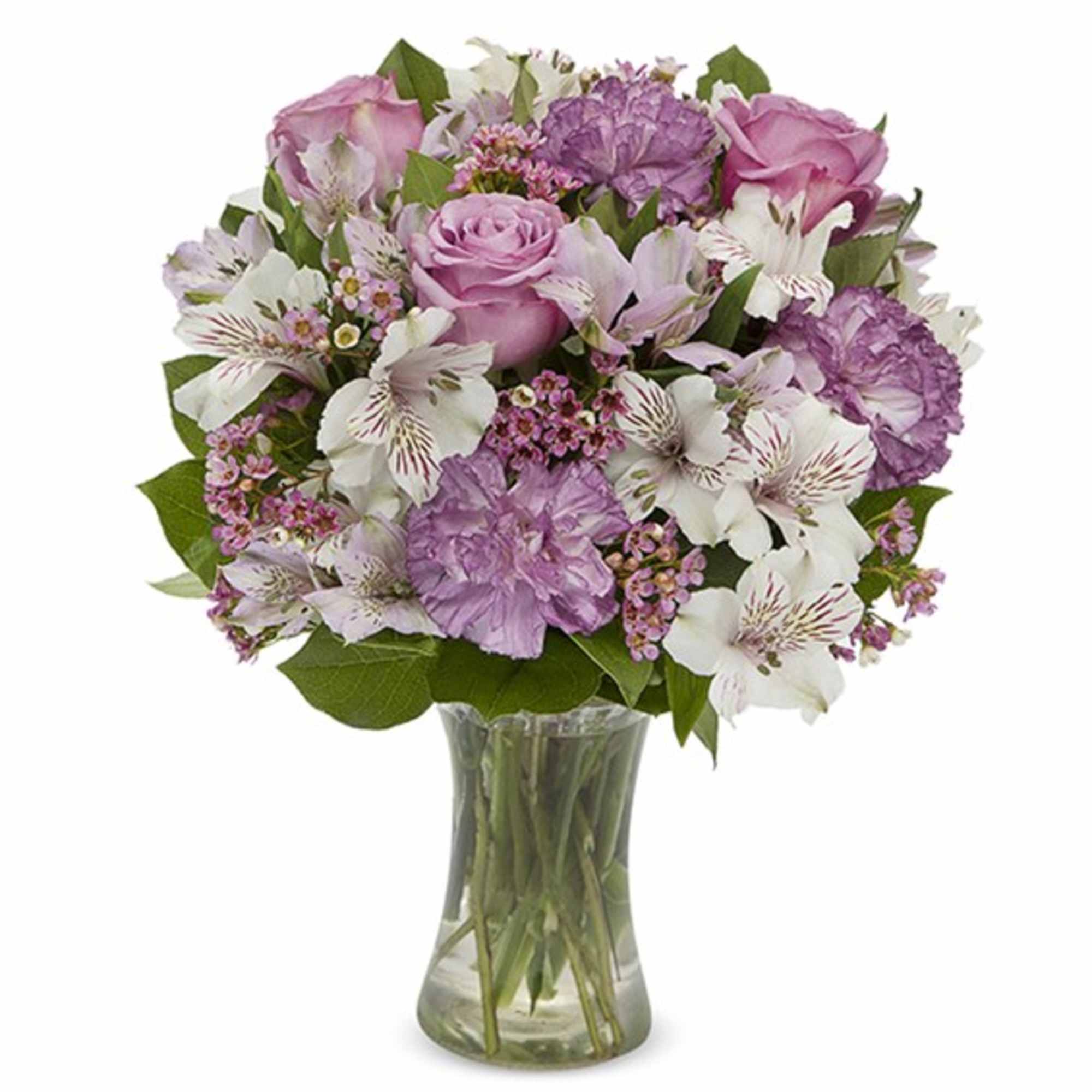 Pink and white mixed bouquet in a clear glass vase