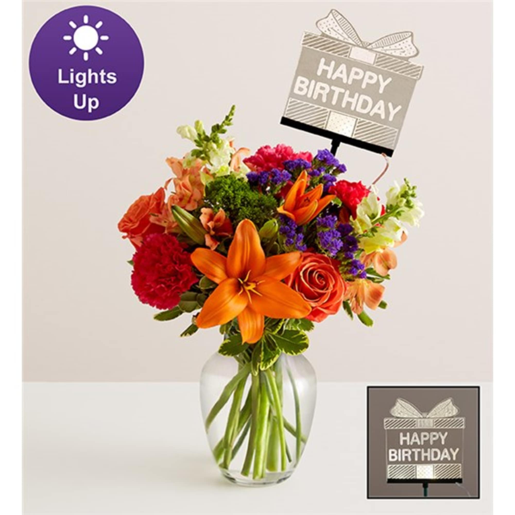 Mixed bouquet in a glass vase with a birthday sign