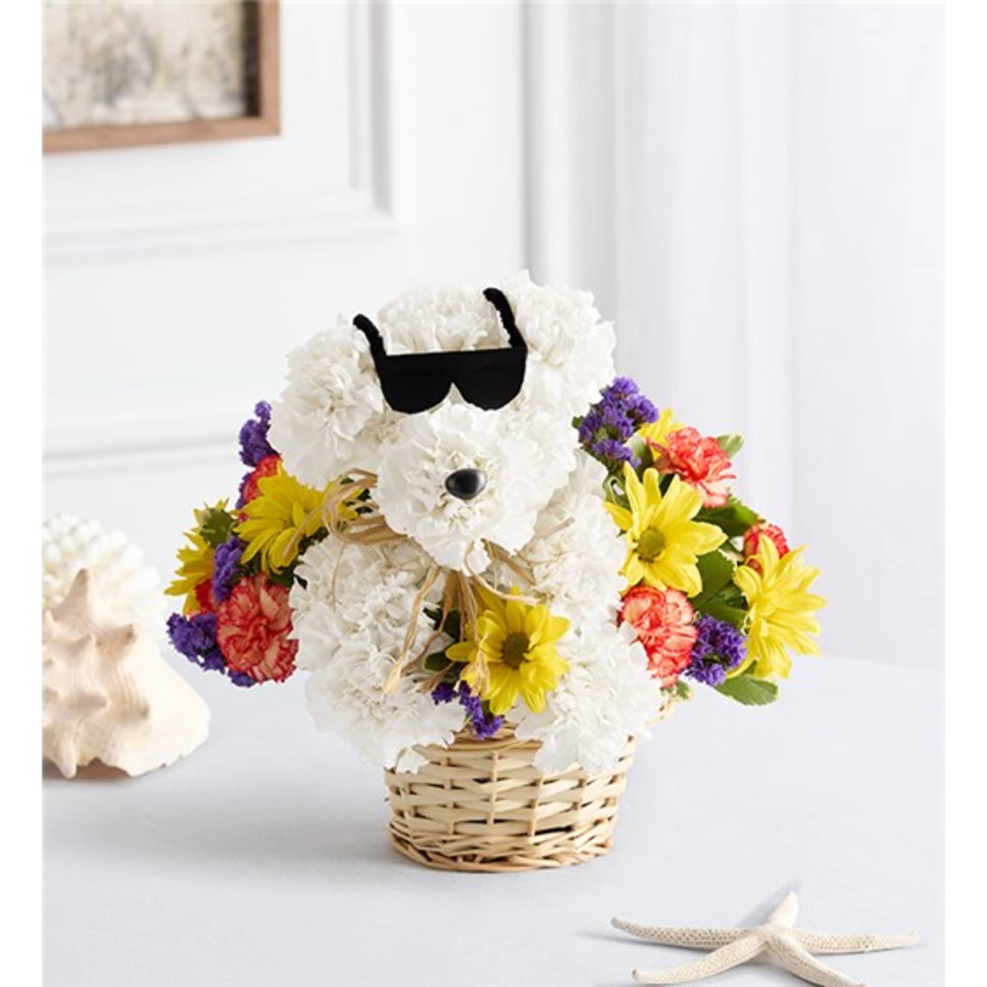White teddy bear made of flowers in a wicker basket with colorful blooms