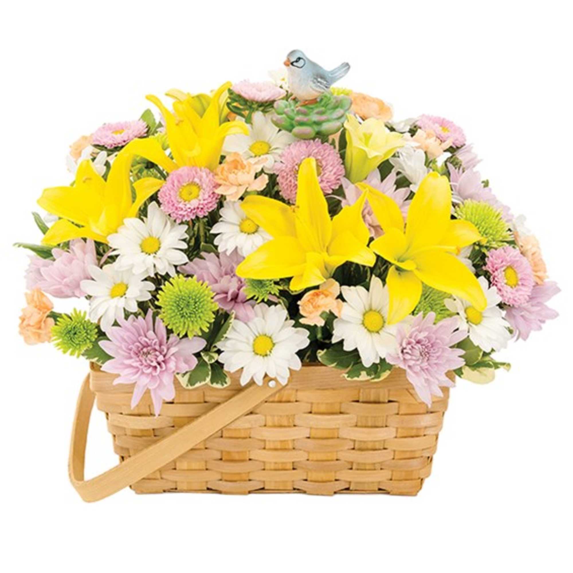 Basket of yellow lilies and pastel daisies with a small bird figurine