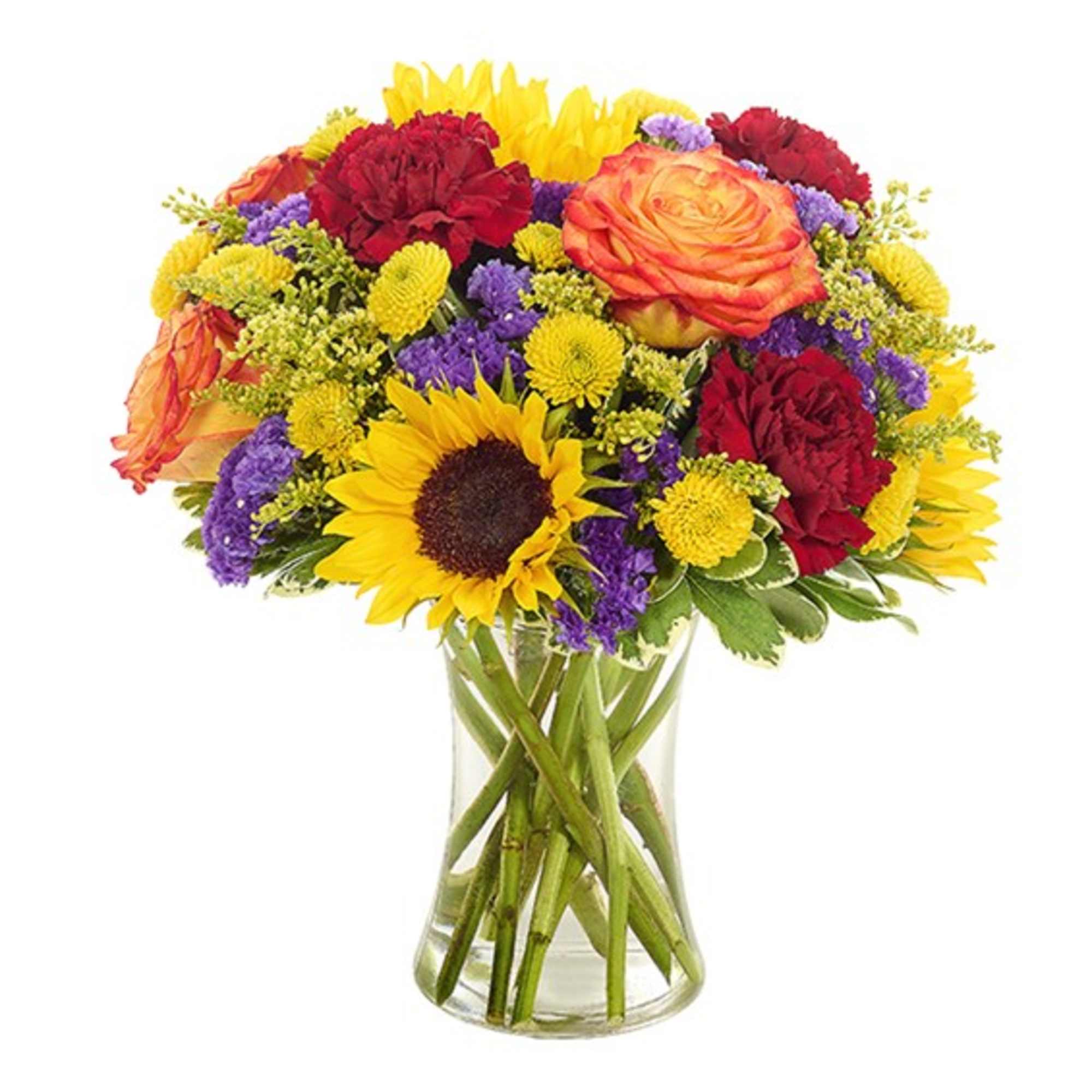Mixed bouquet of sunflowers, roses, carnations, and purple filler in a glass vase