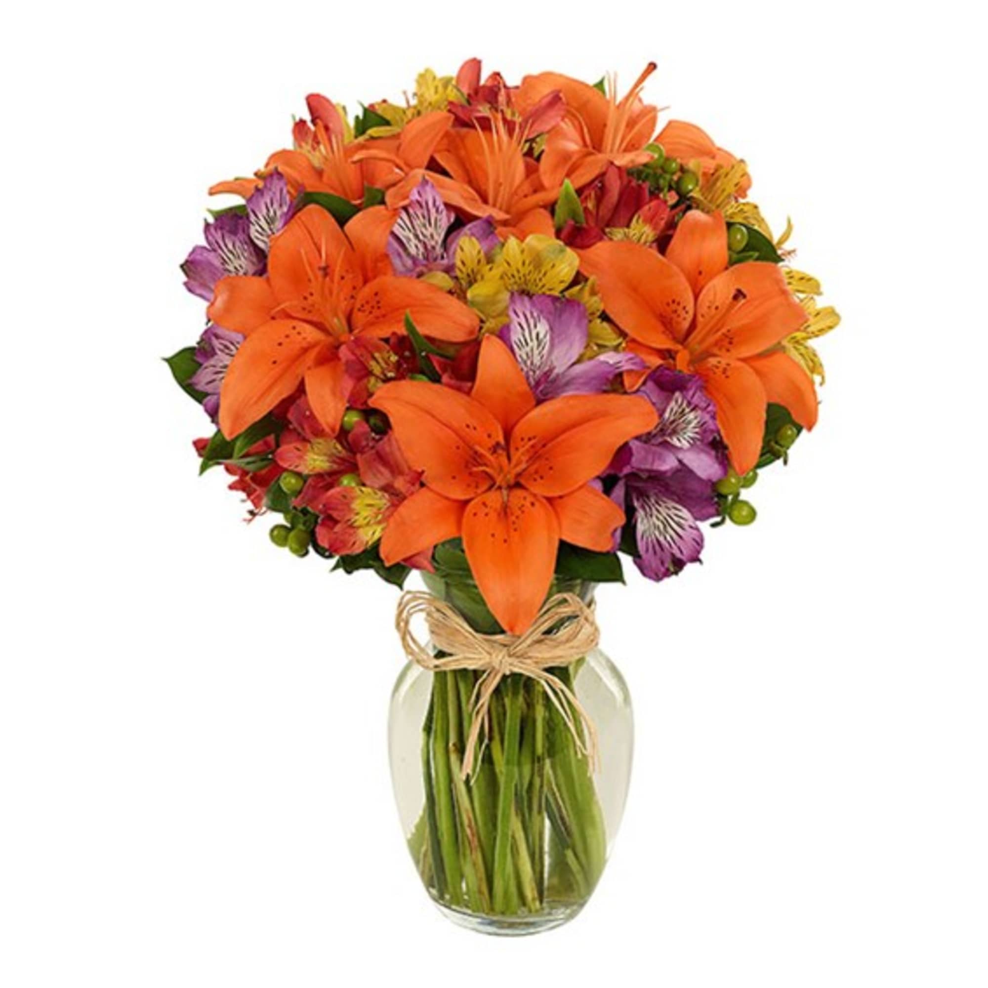 Bouquet of orange lilies and purple alstroemeria in a glass vase