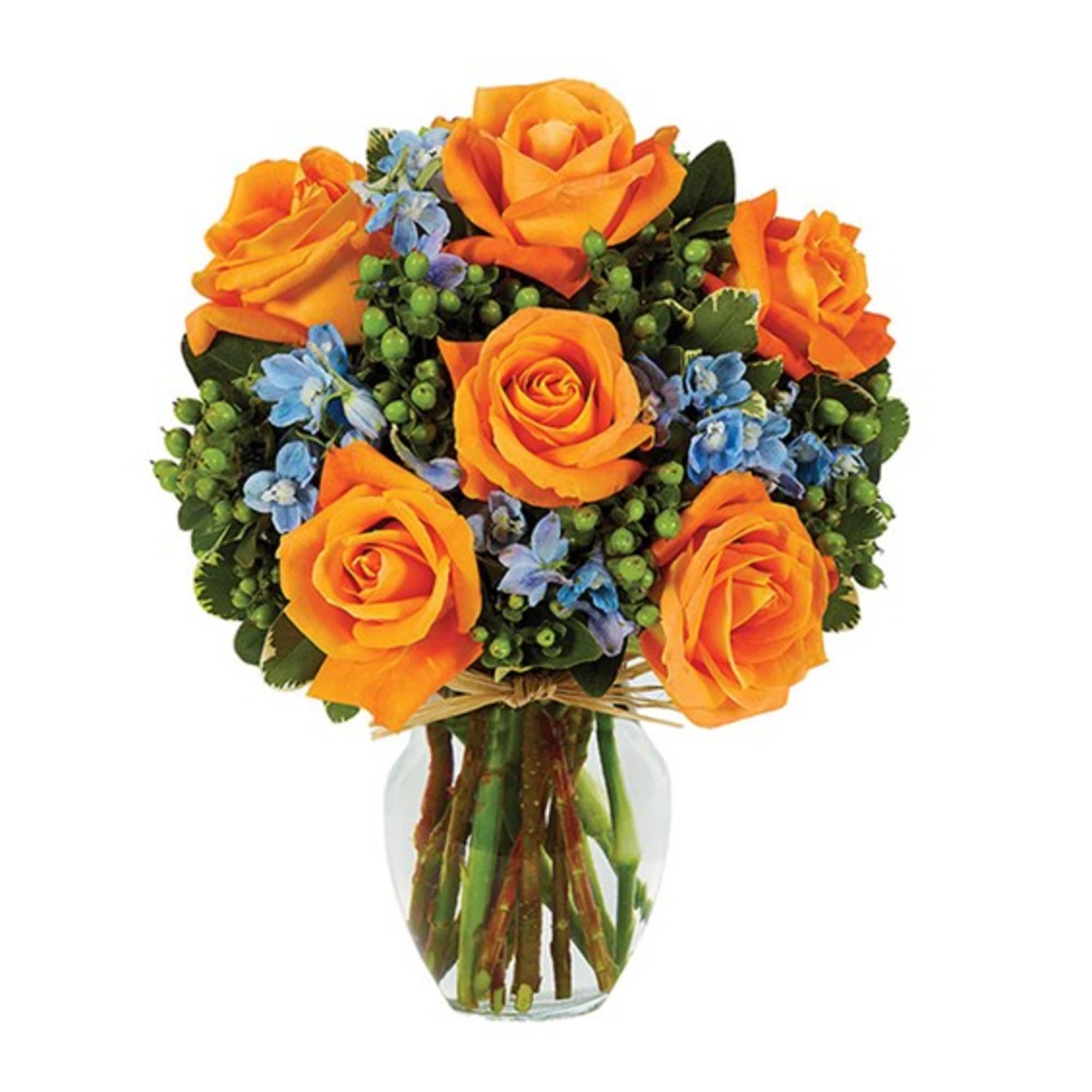 Orange roses with blue flowers in a clear glass vase