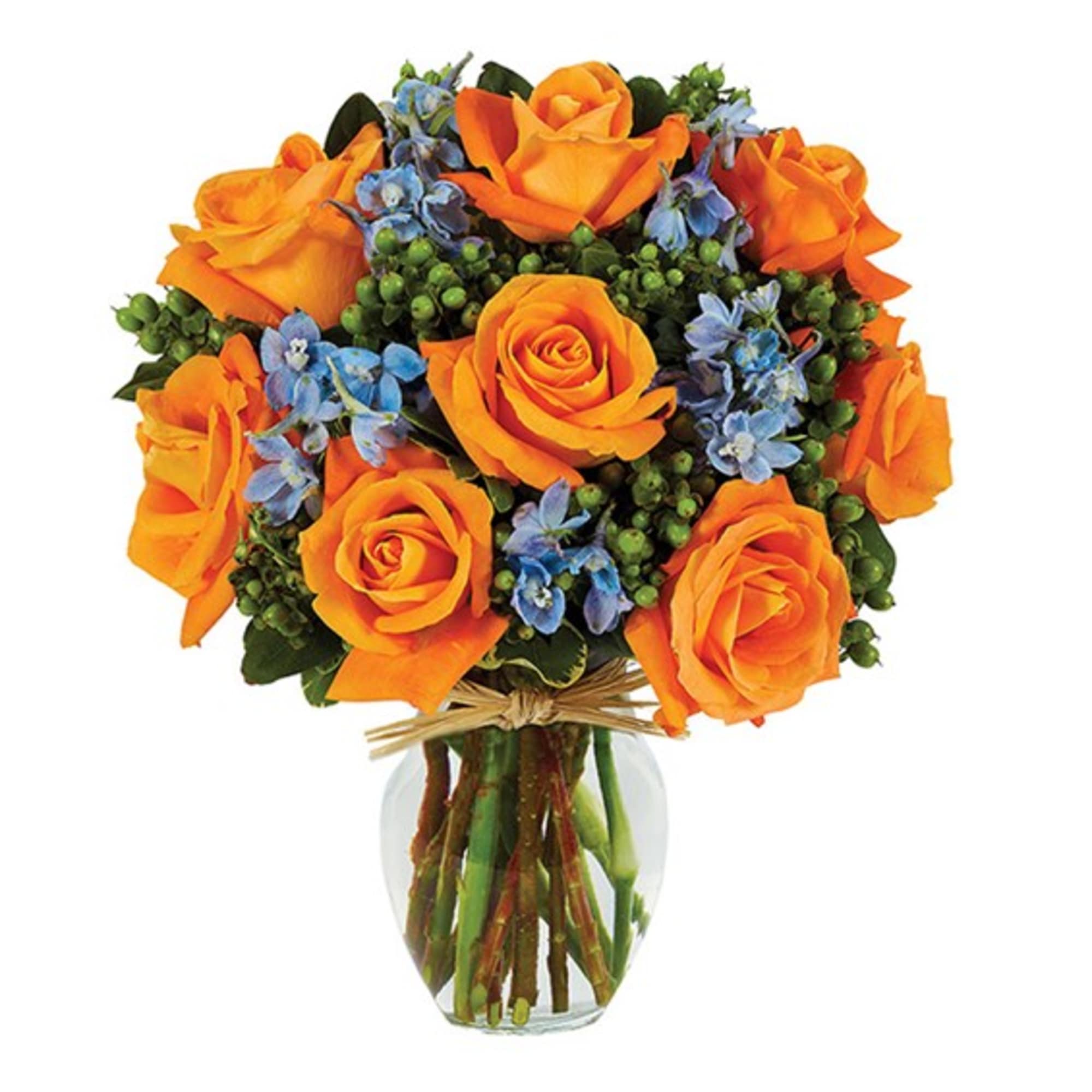 Orange roses with blue flowers in a clear glass vase