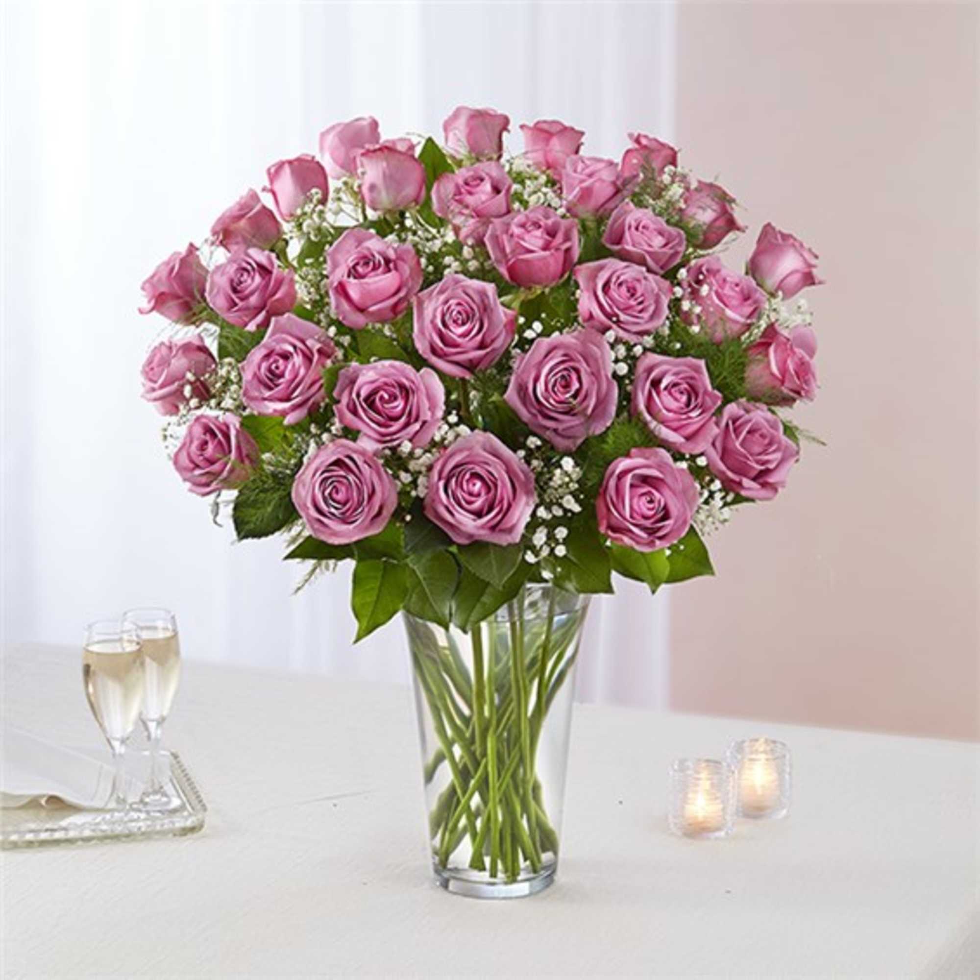 Pink rose bouquet in a clear glass vase