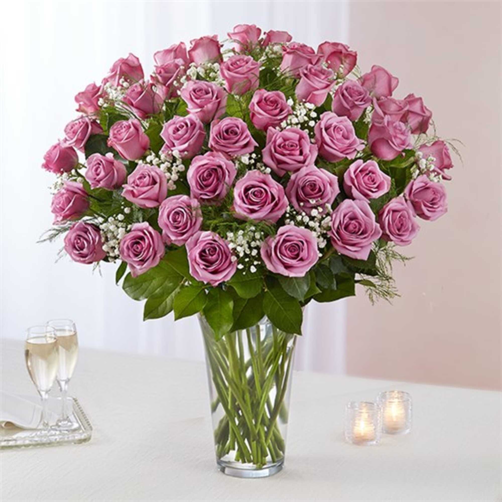 Pink rose bouquet in a clear glass vase