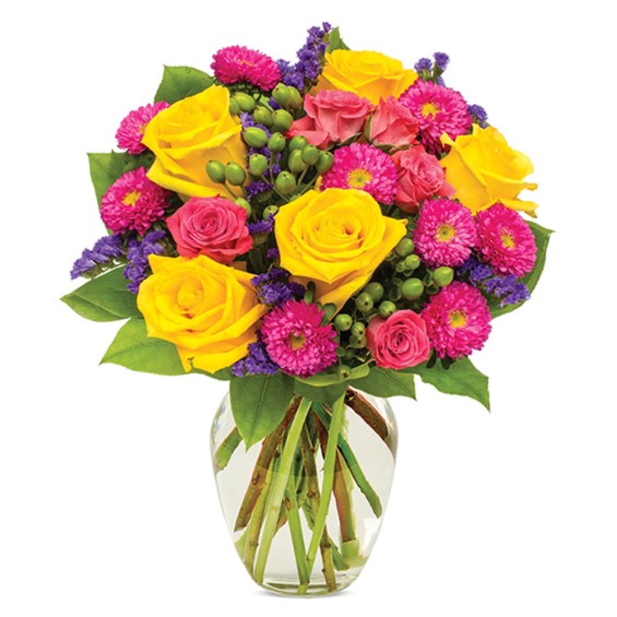 Bouquet of yellow and pink roses with magenta daisies in a clear glass vase