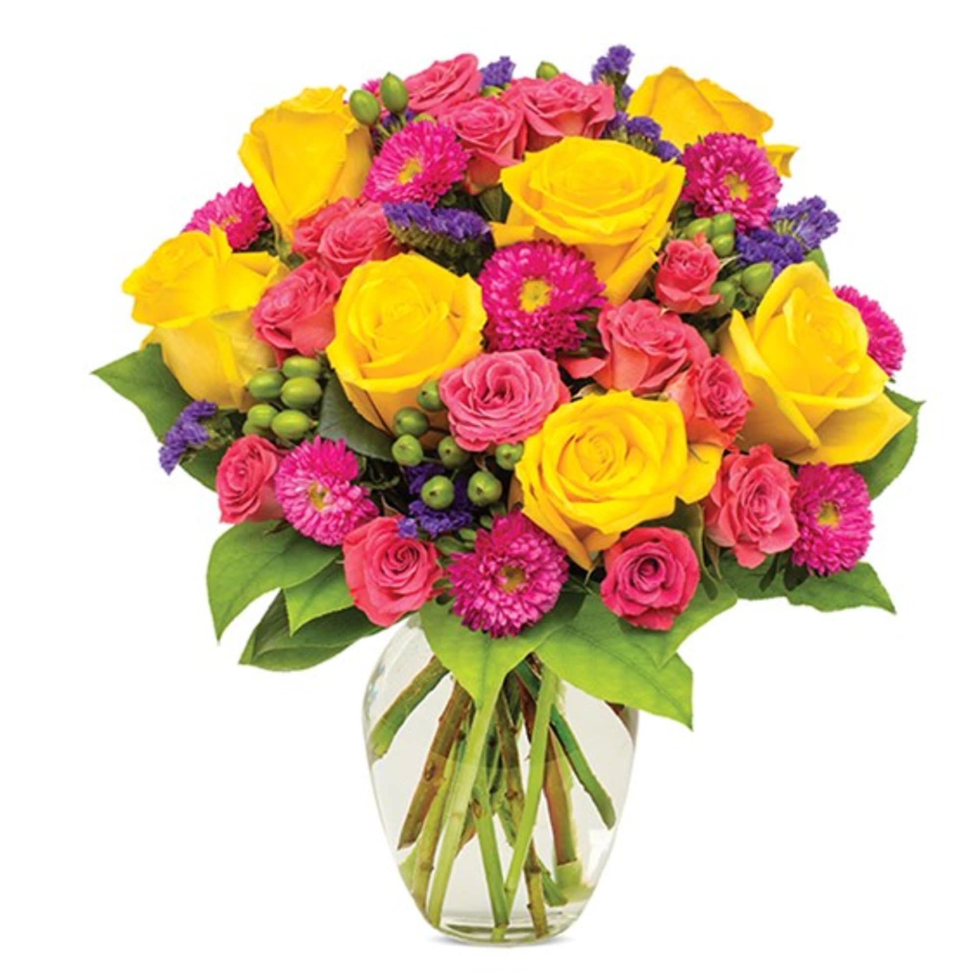 Bouquet of yellow and pink roses with magenta daisies in a clear glass vase