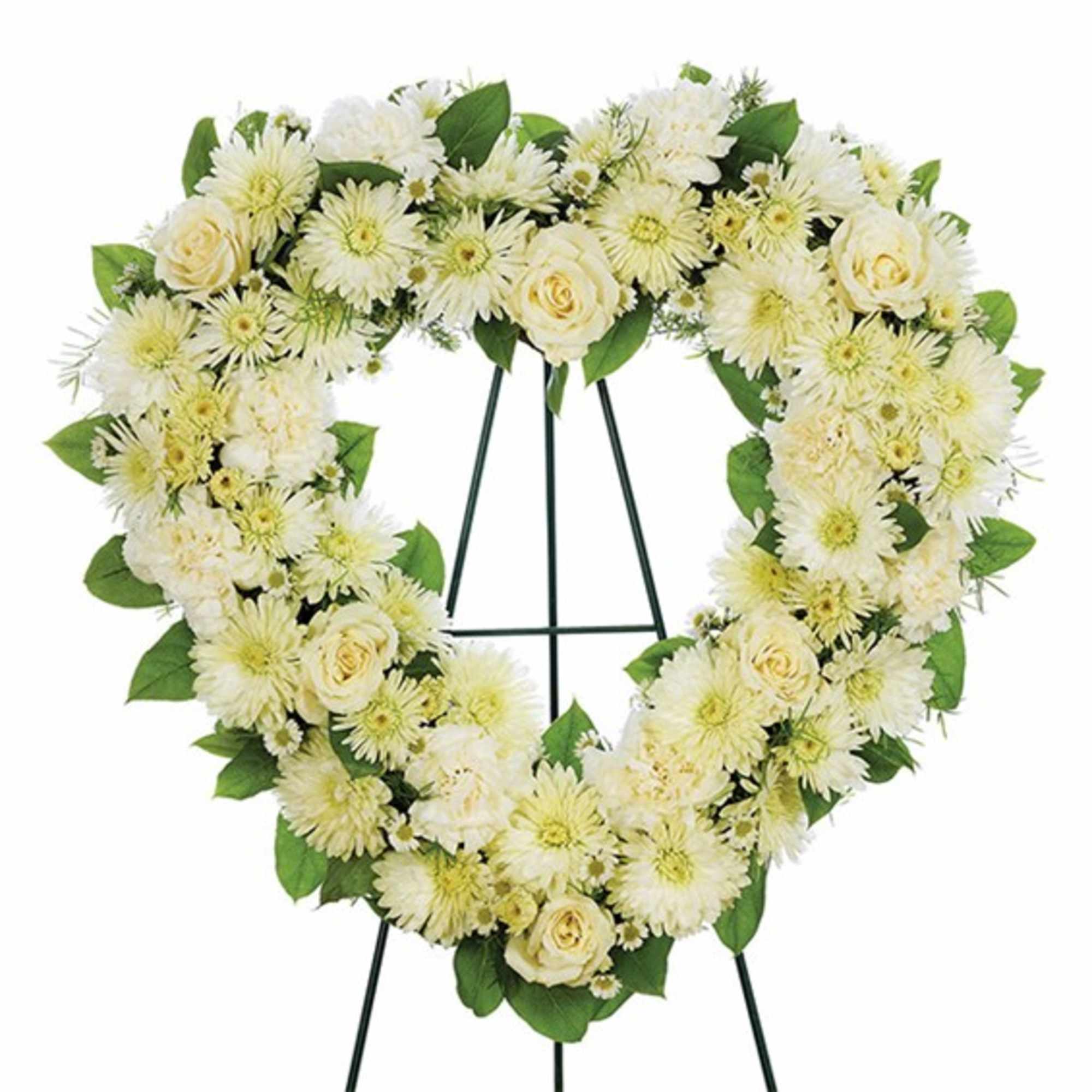 Heart-shaped white floral wreath on a standing easel