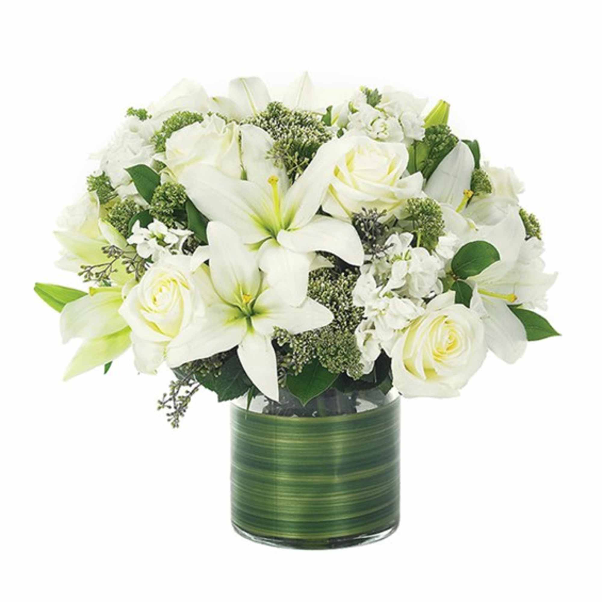 White lilies and roses in a green glass vase