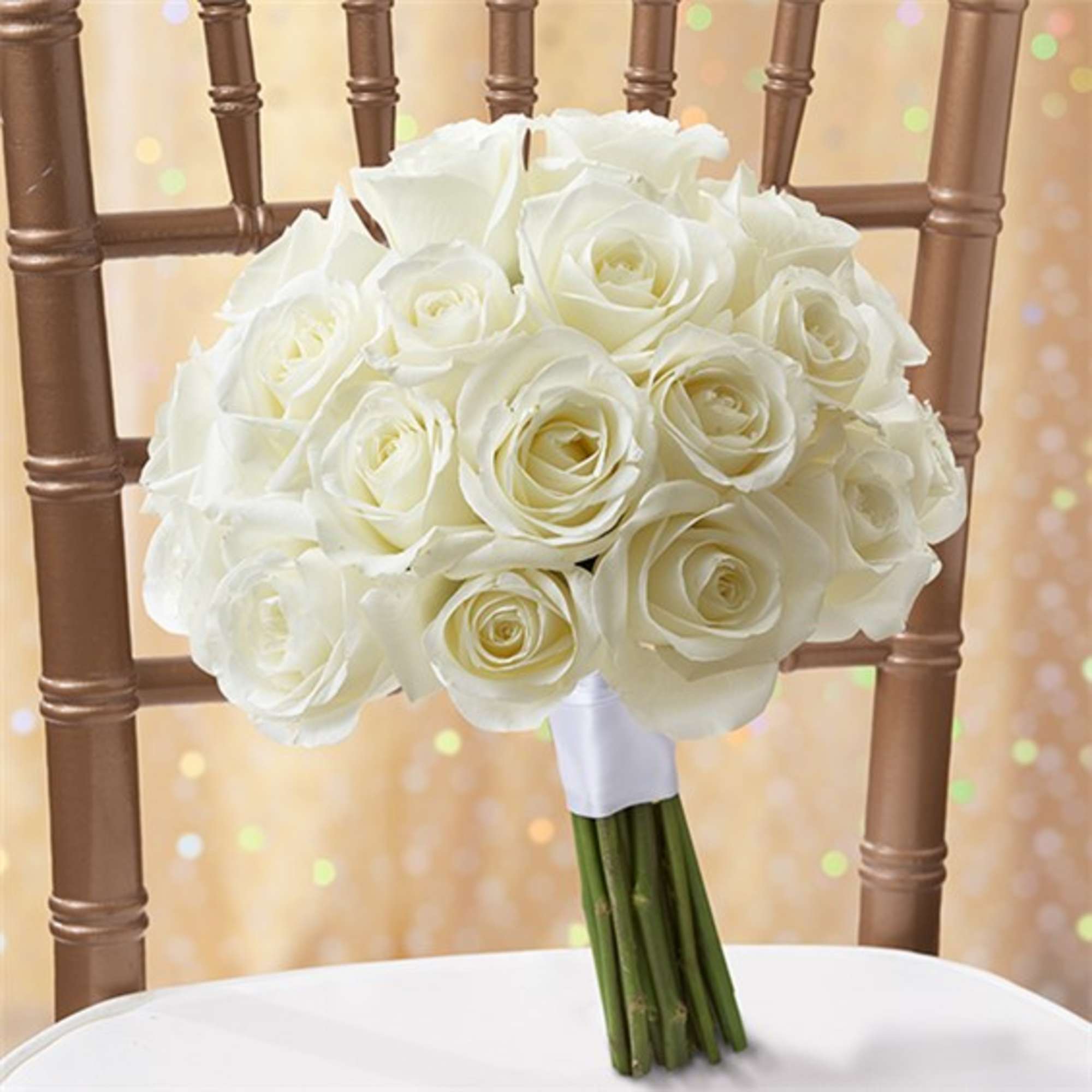 White rose bridal bouquet with a wrapped stem