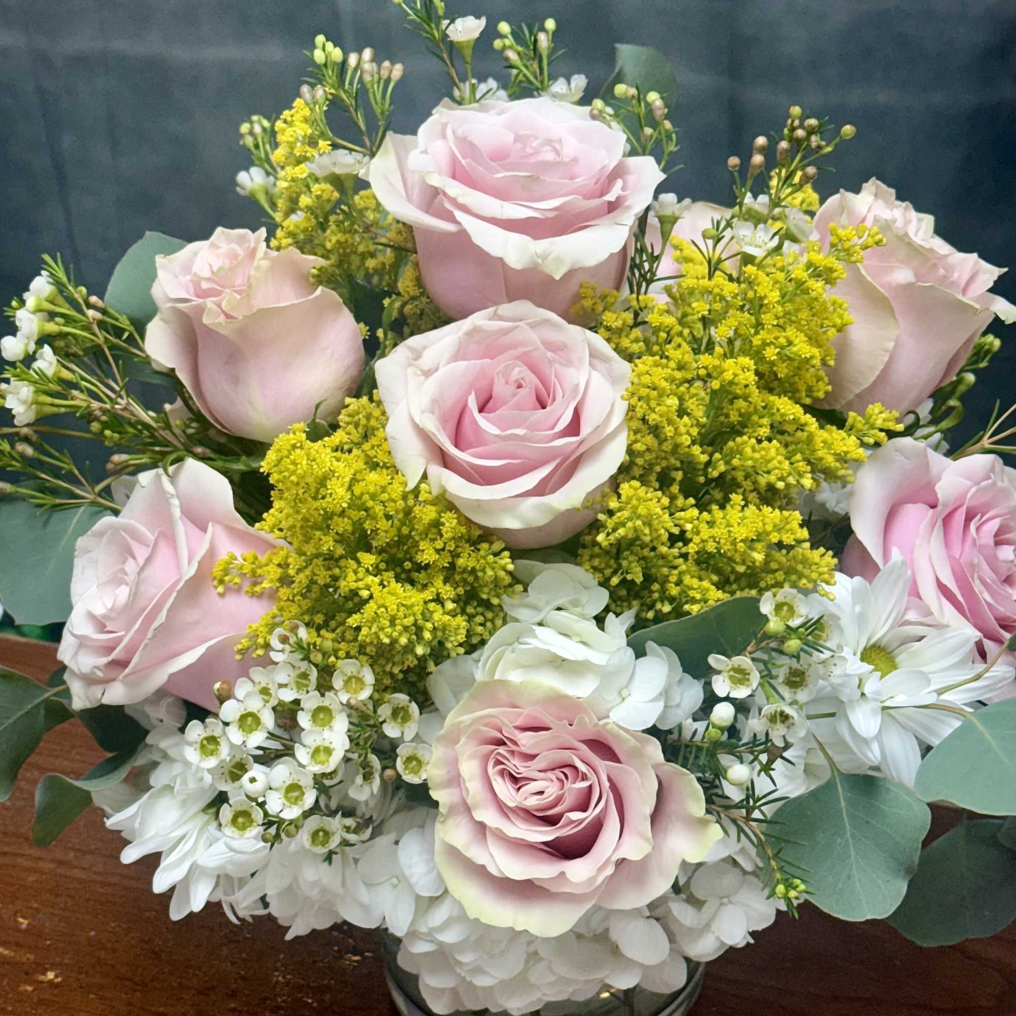 Celebrate the beauty of the season with Spring Blooms! This fresh flower
