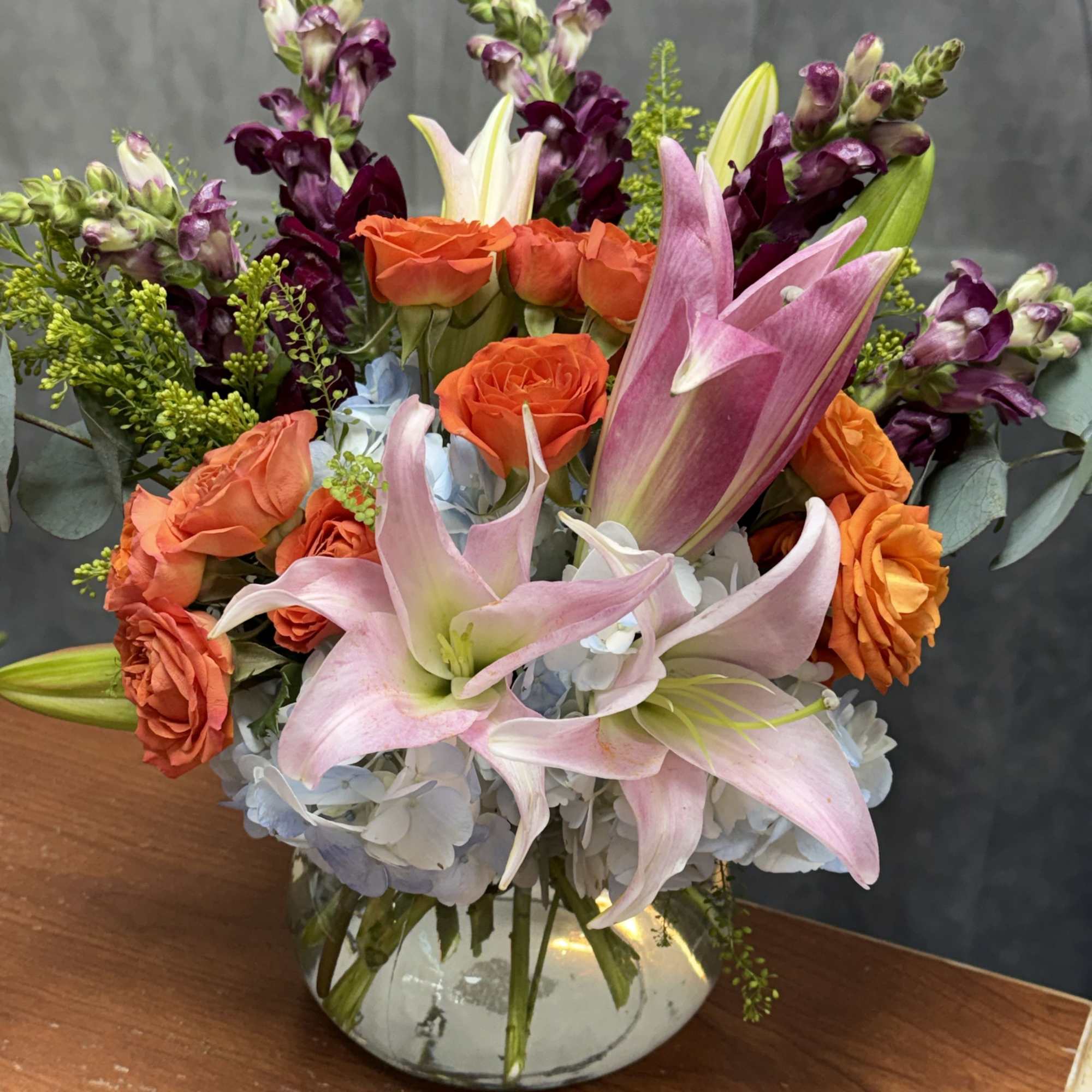 Flamingo Sunset is a vibrant floral arrangement bursting with warmth and elegance., photo 2 of 2