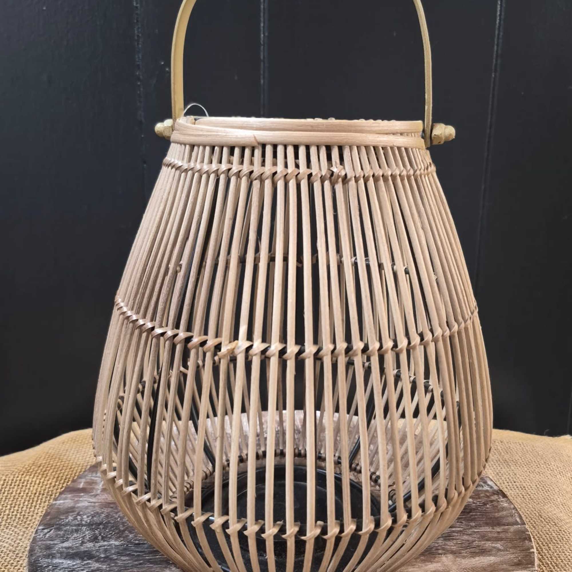 This beautiful rattan 10" lantern is a gift-ready centerpiece
Dimensions:  9" x