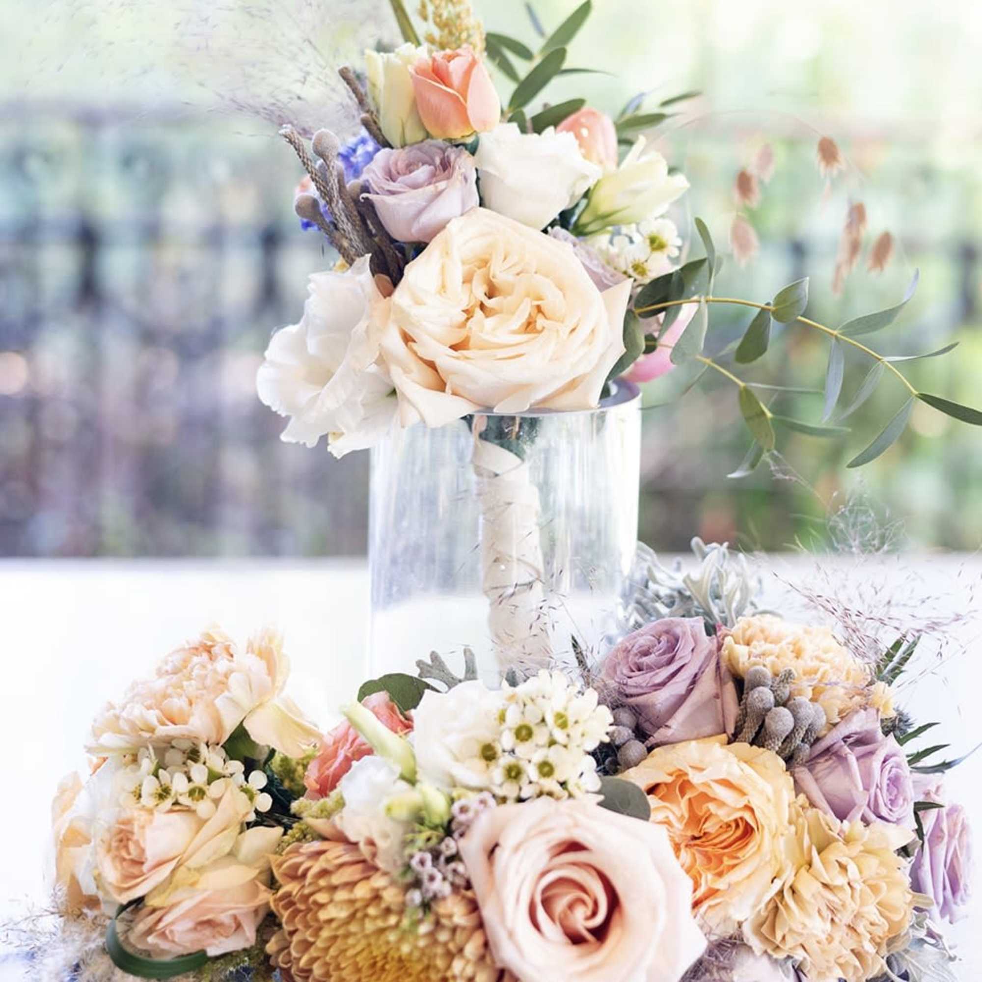 "Hand-crafted by accredited Master Florist Tricia Won (AIFD, EMC, IMF) using premium