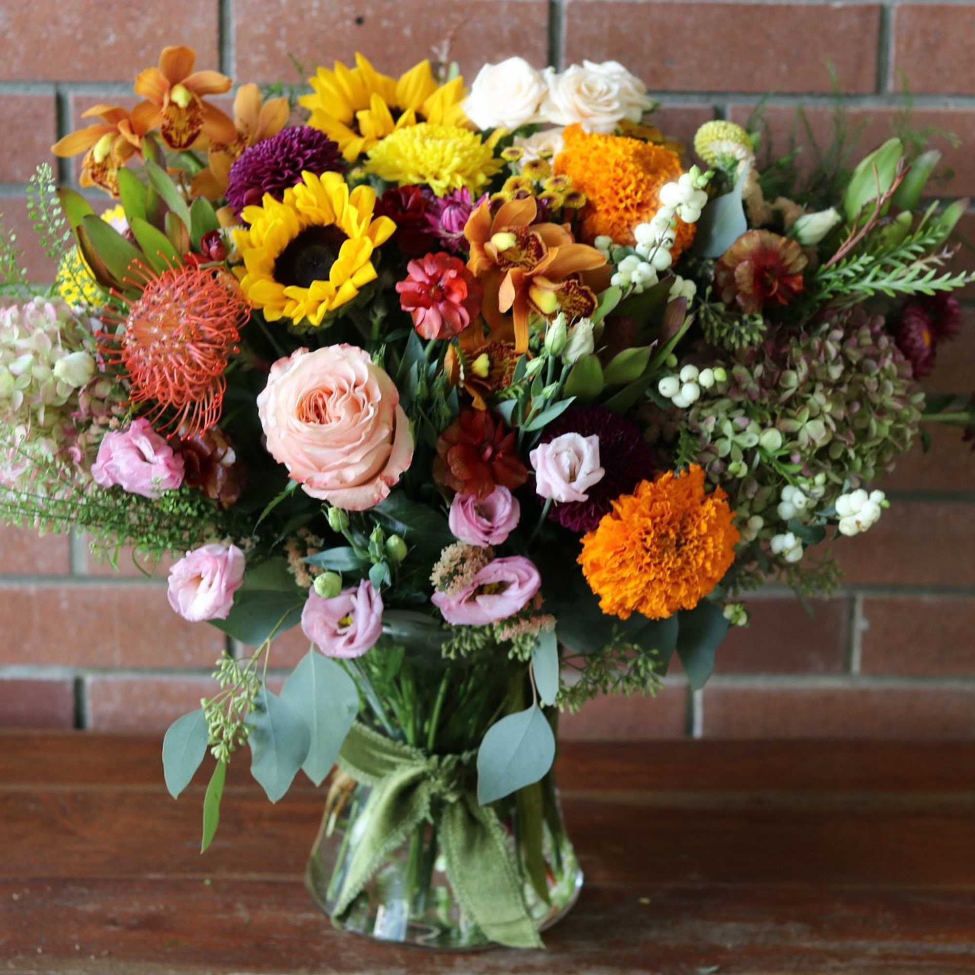 The Farm Fresh Fall Bouquet by Venetian Flowers is a stunning celebration