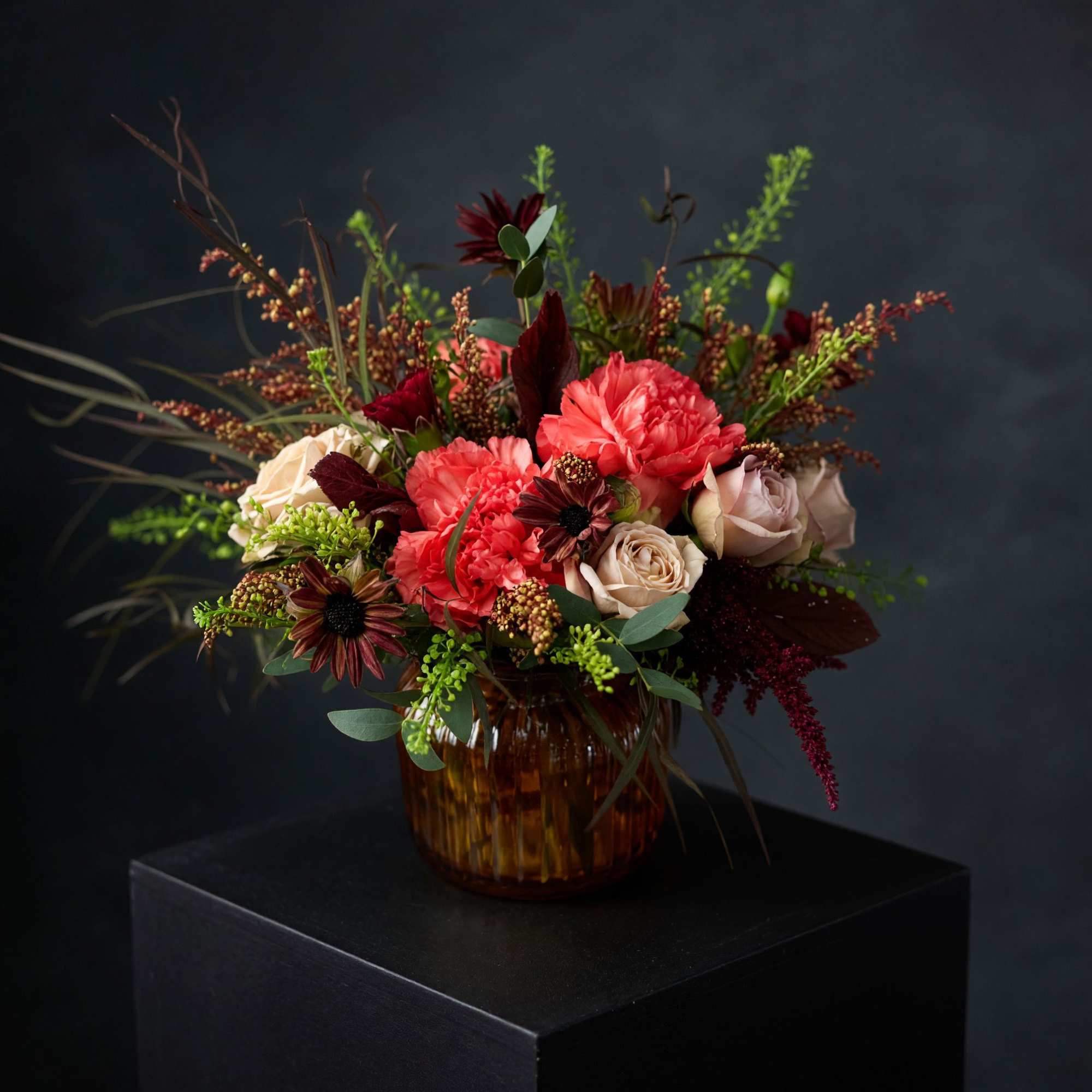 Warm, vibrant, and full of fall charm &mdash; the Amber Glow arrangement