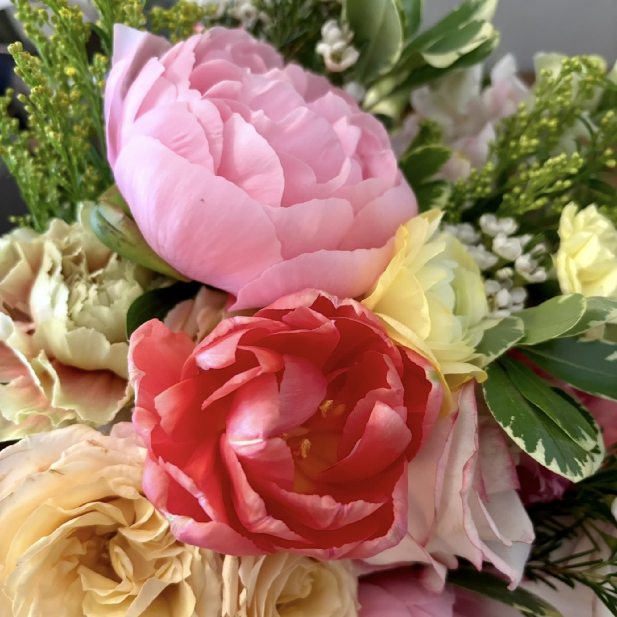 The Daily Bouquet contains a mix of fresh, seasonal flowers and greenery.