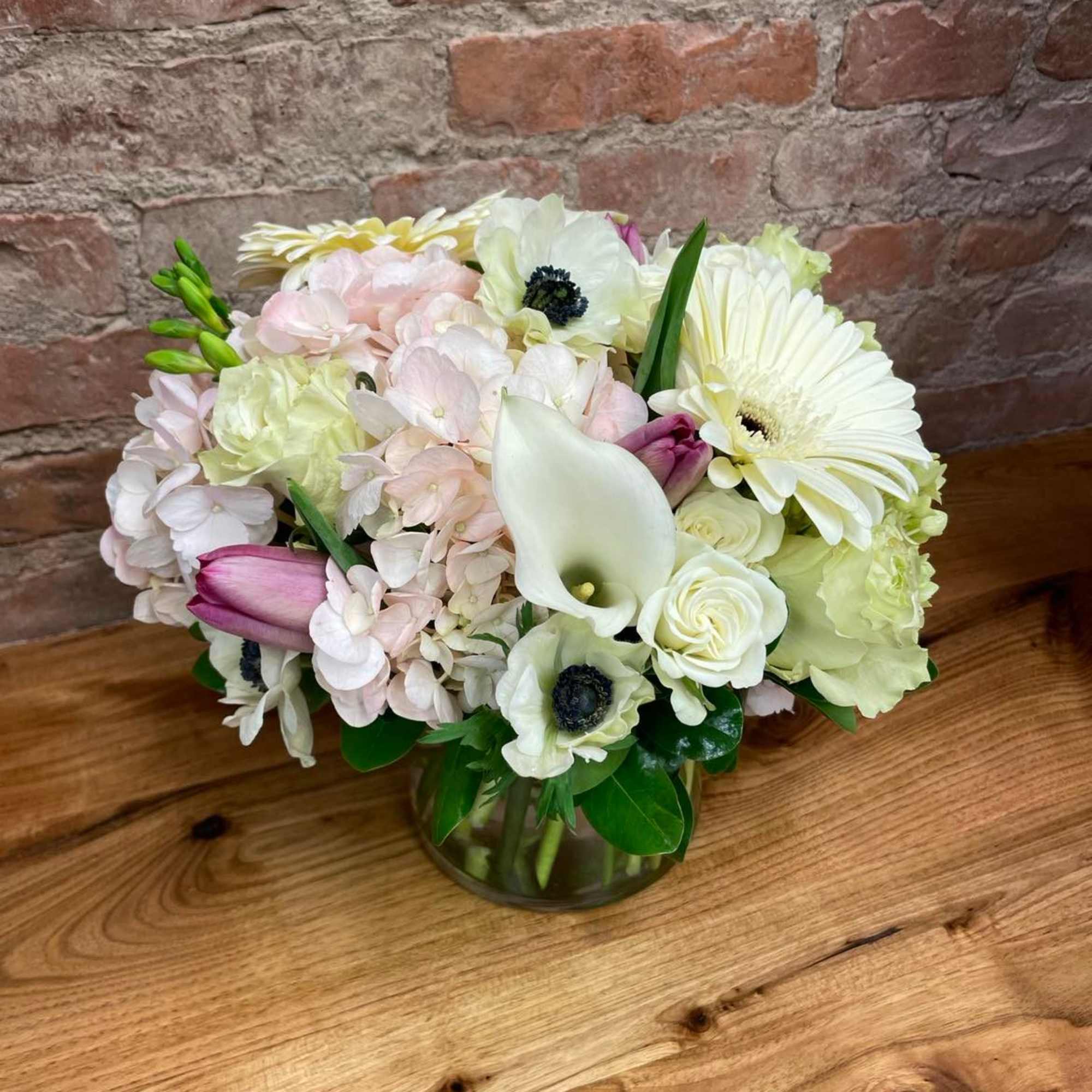 Loose, airy, and inspired by the garden. This design highlights softer colors